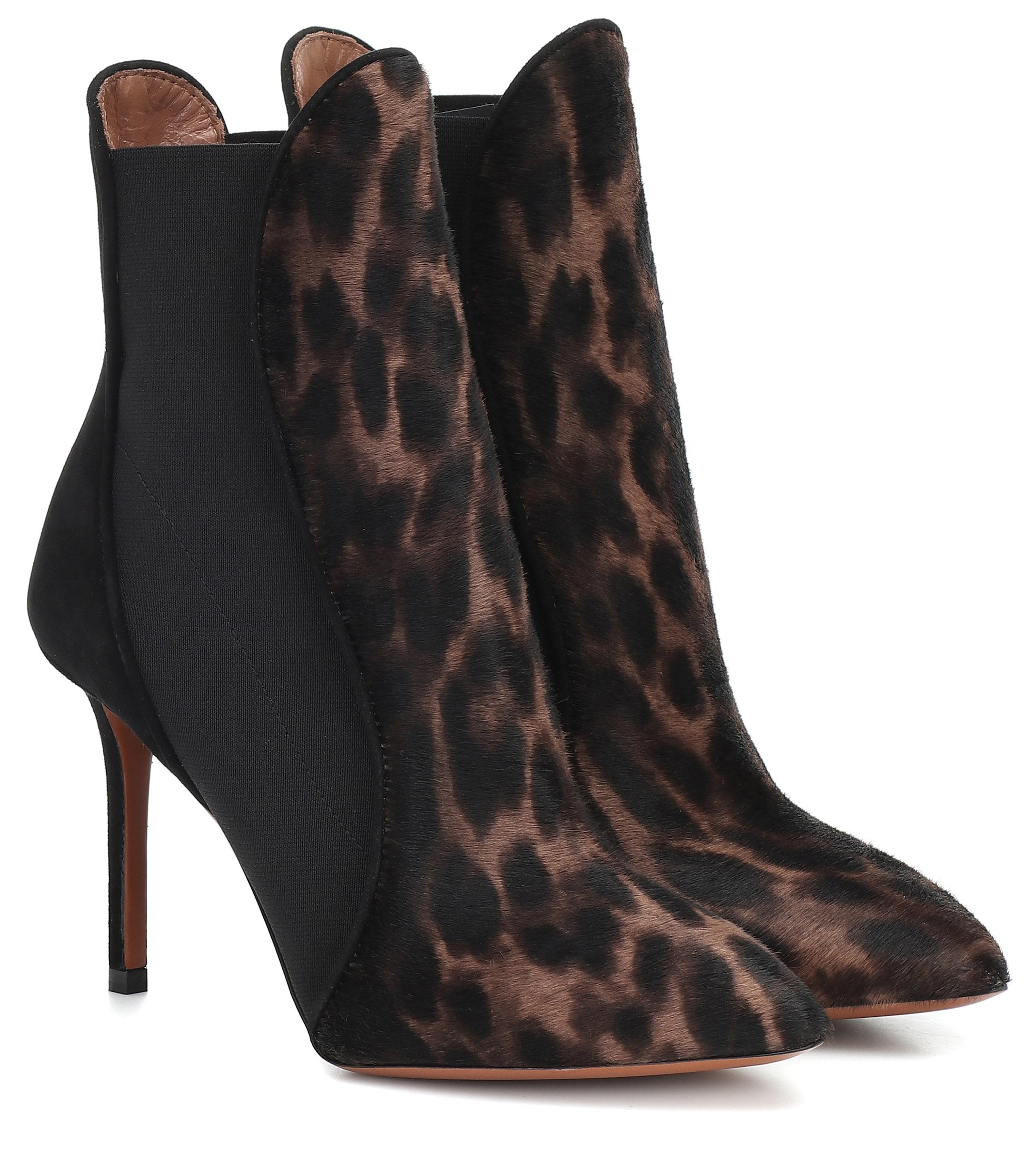 black ankle boots with animal print heel