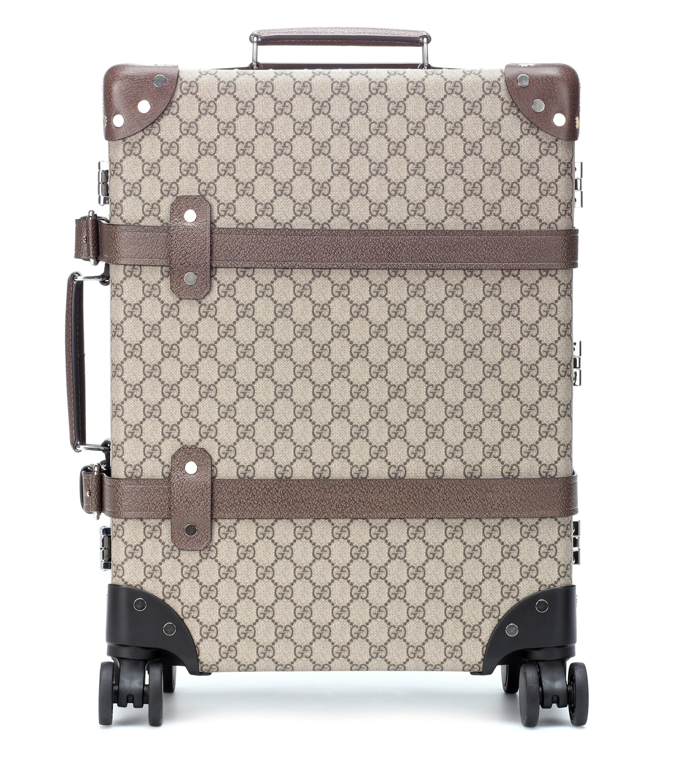 gucci rolling luggage