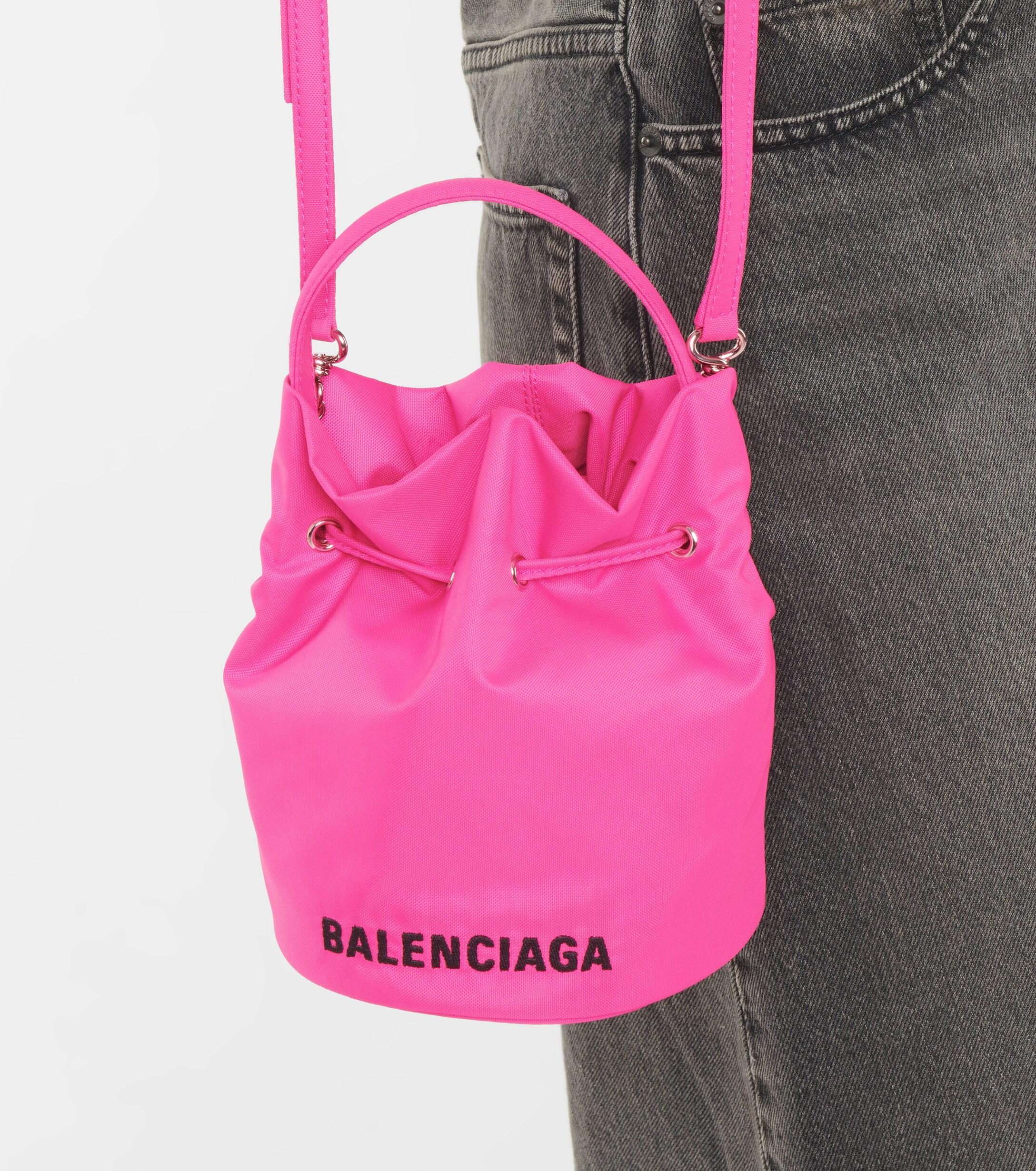 pink balenciaga bucket bag