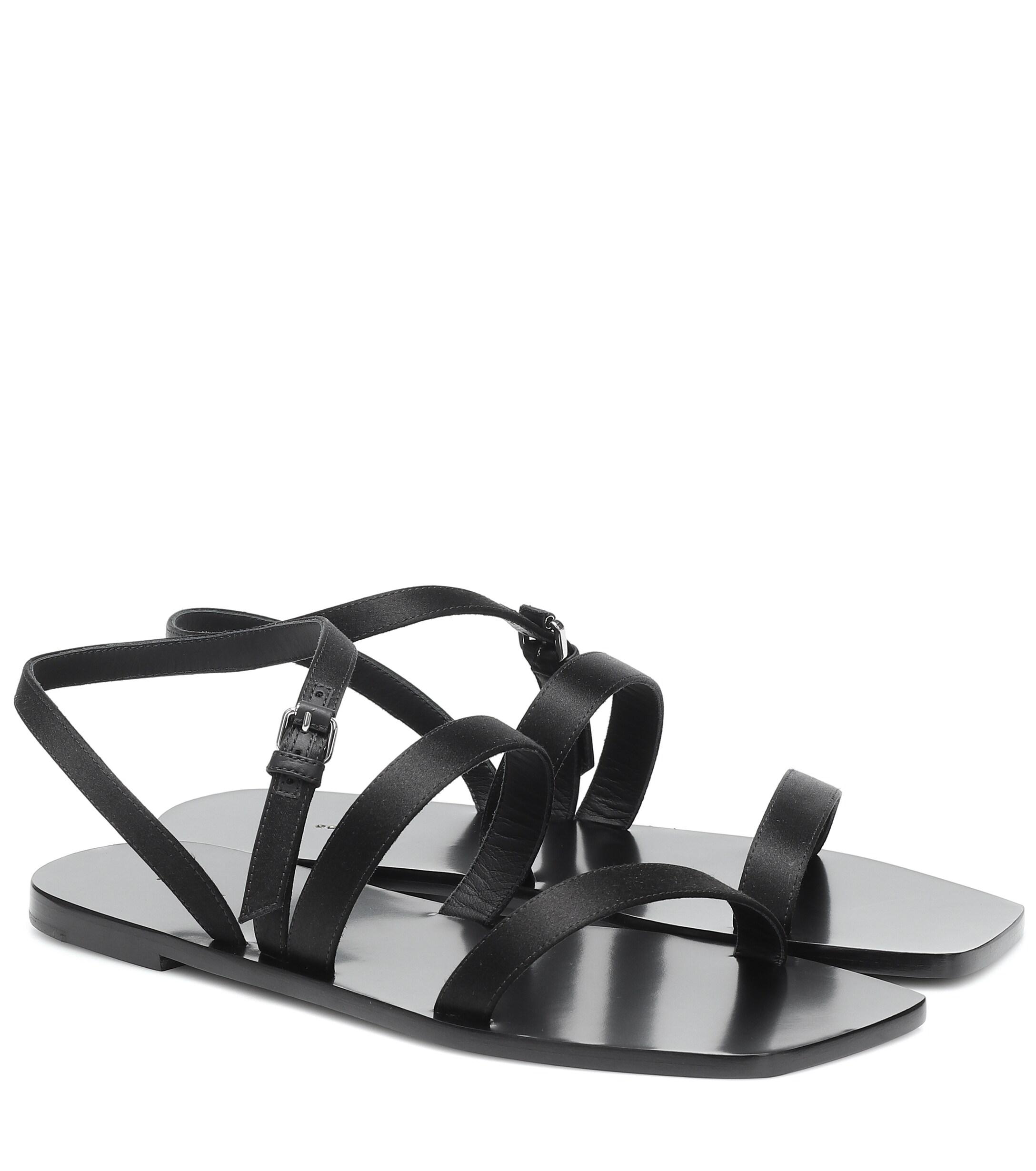 The Row Flat Wedge Leather Sandals in Black - Lyst
