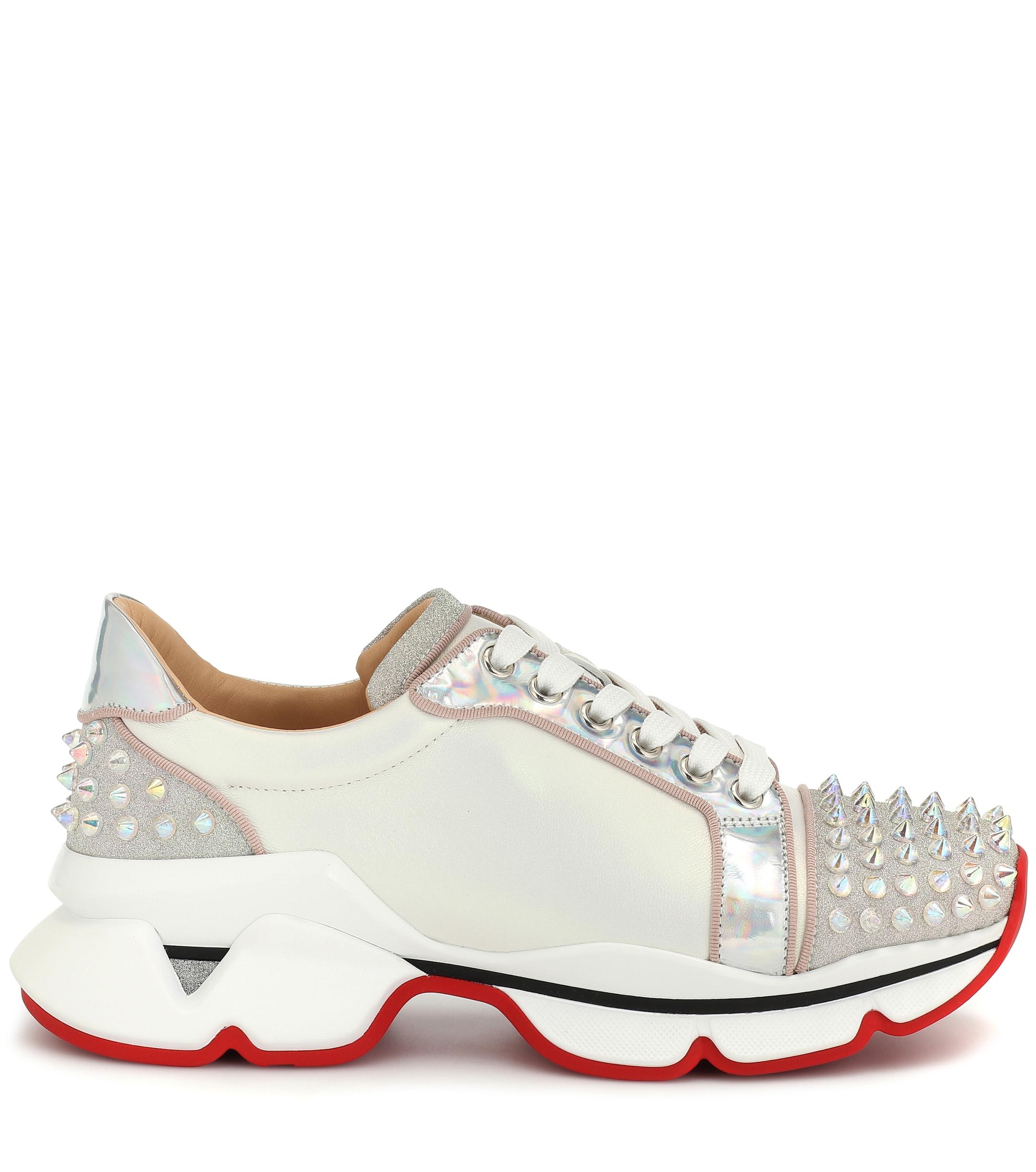 louboutin studded sneakers