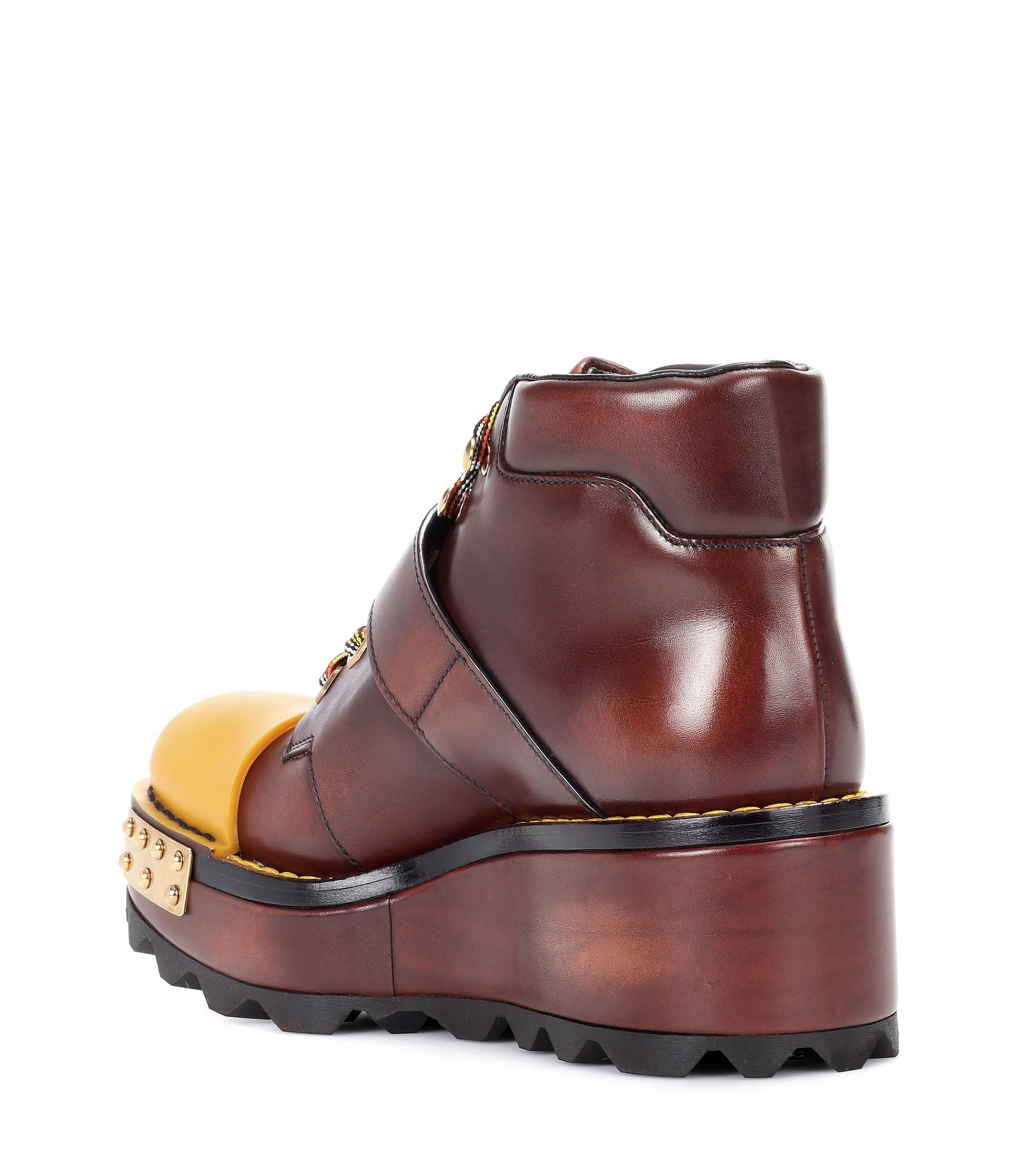 Prada Leather Platform Boots in Brown Lyst