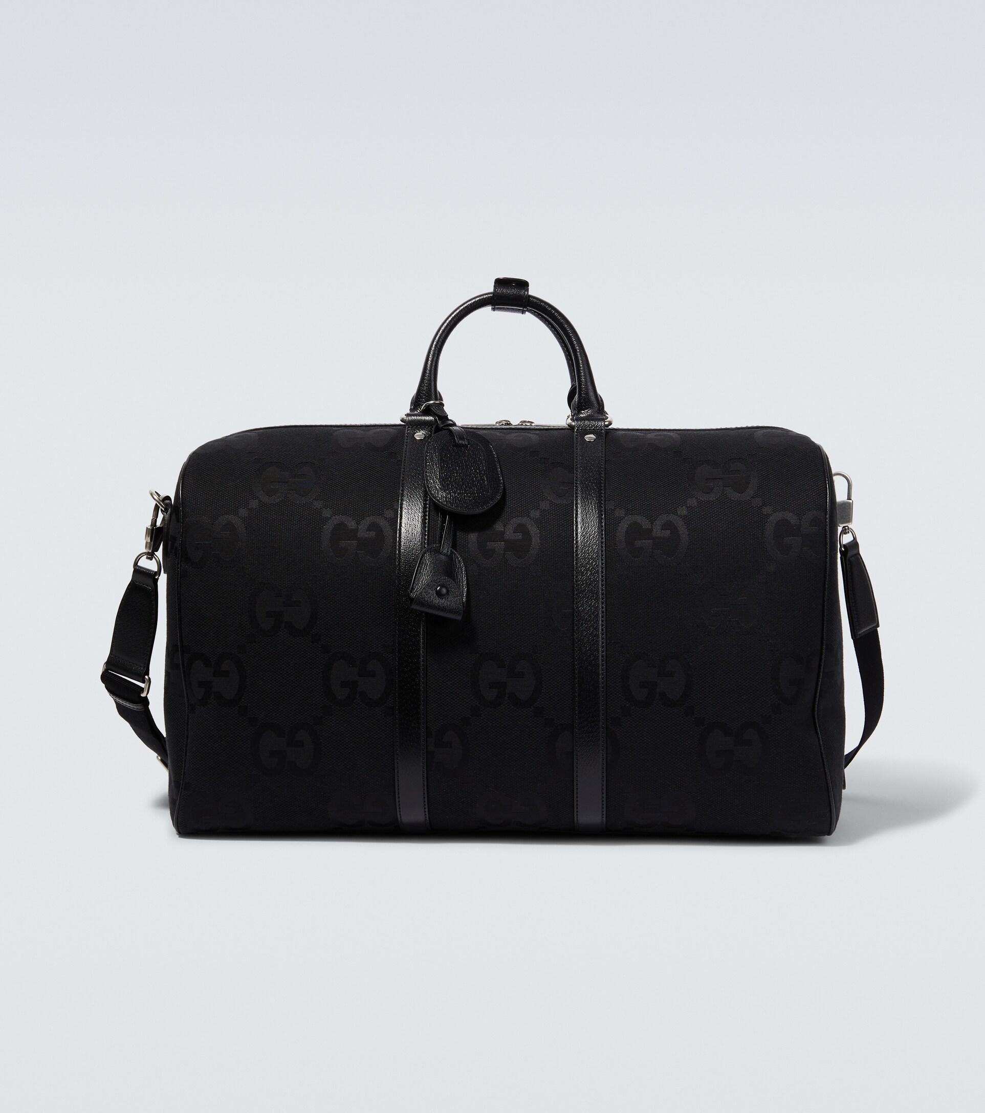 Gucci Jumbo GG Leather-trimmed Travel Bag in Black for Men | Lyst
