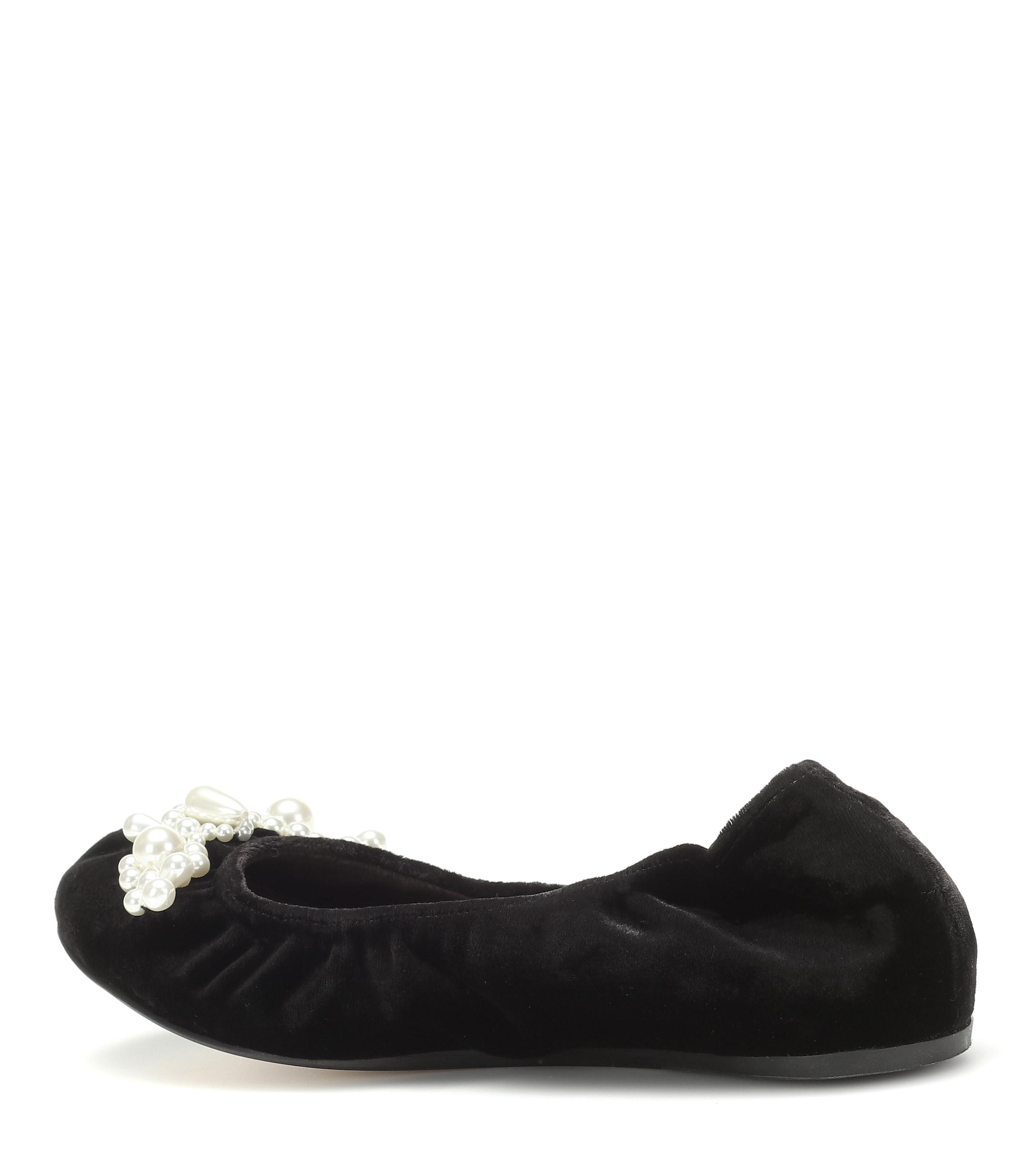 flat shoes with bows on them