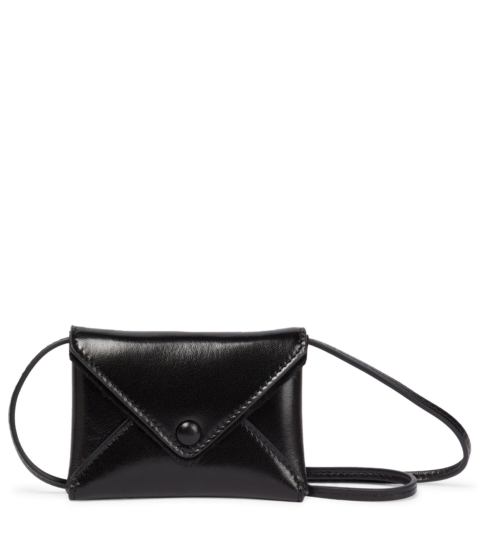 The Row Envelope Mini Leather Belt Bag in Black | Lyst