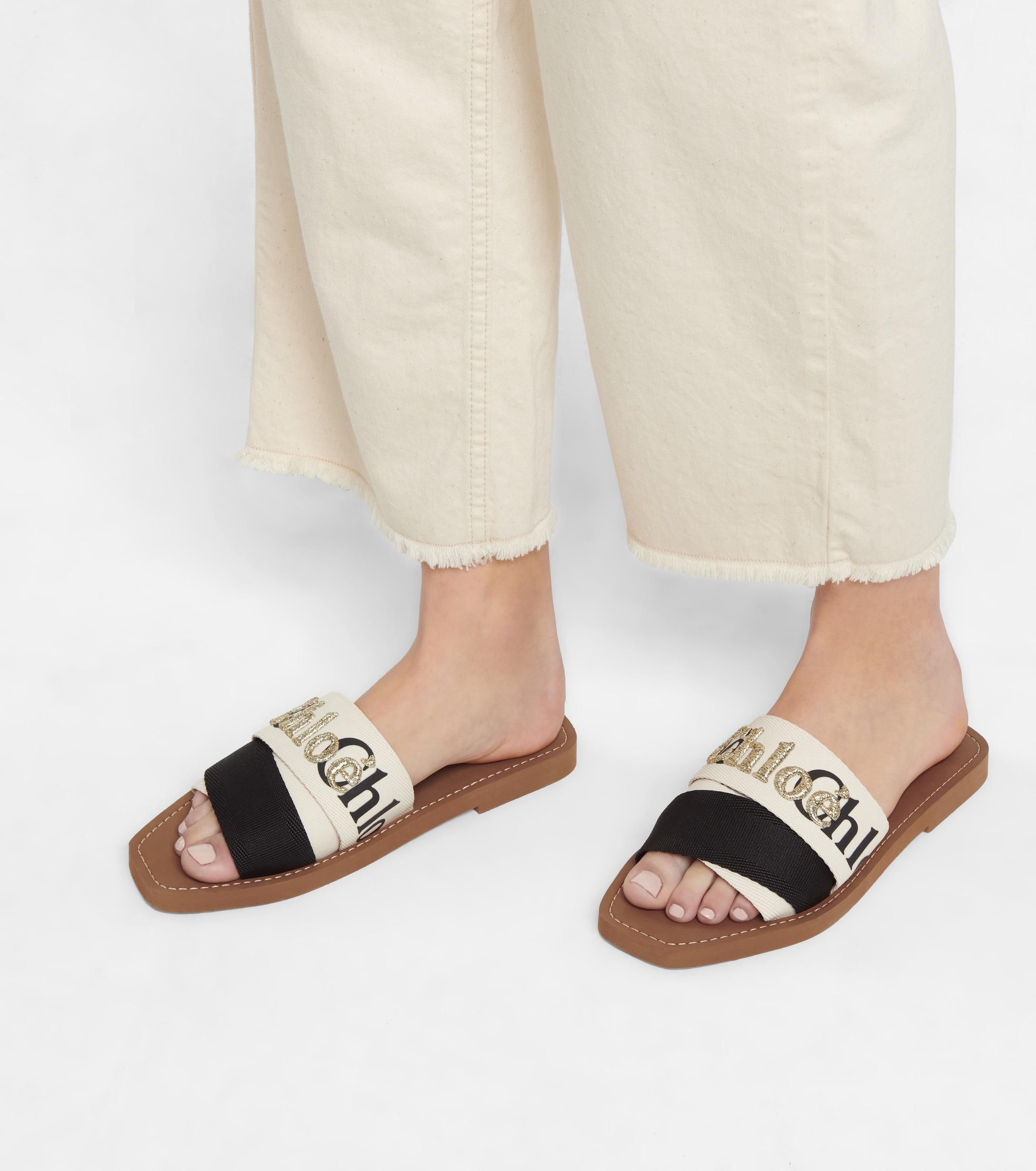 ChloÃ© Woody Embroidered Canvas Slides in White - Lyst