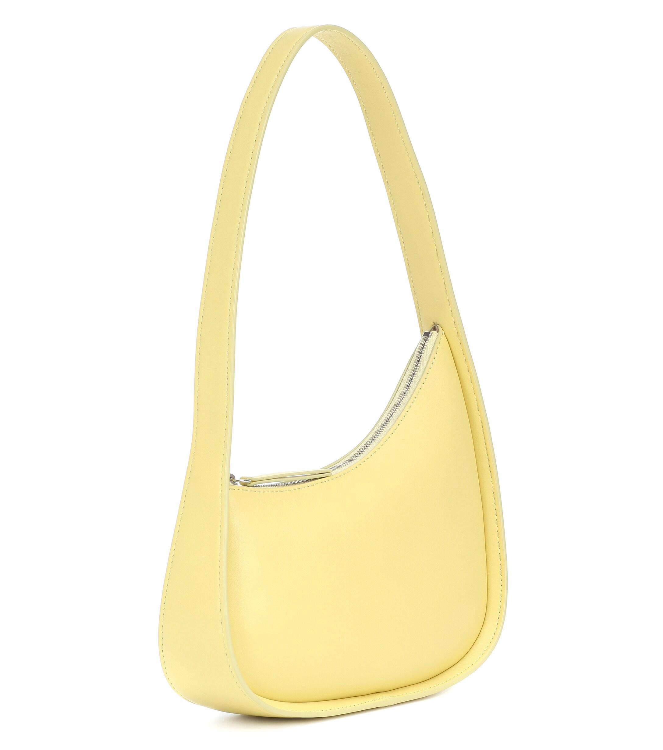 The Row Half Moon Leather Shoulder Bag in Yellow | Lyst