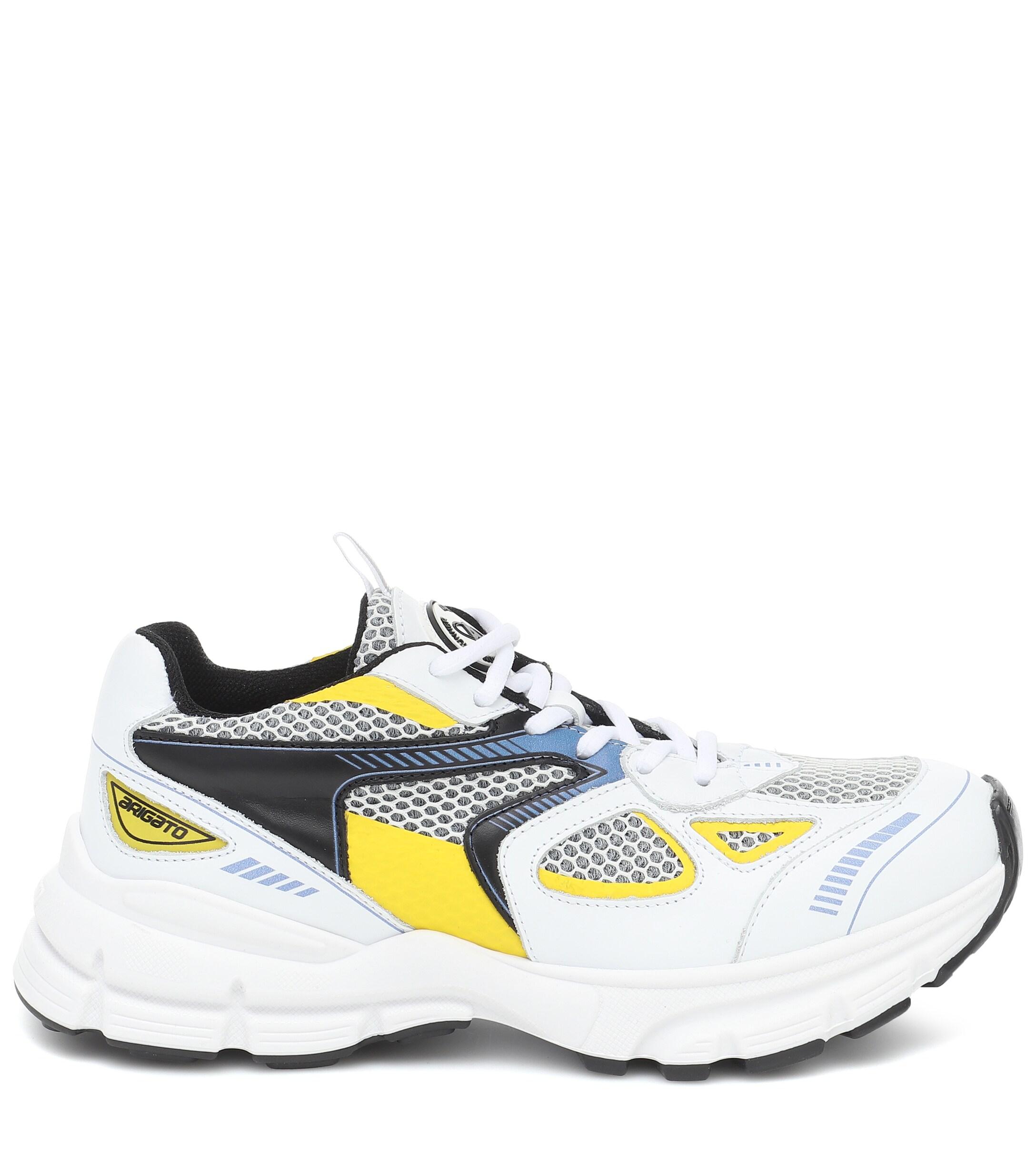 axel arigato marathon runner yellow