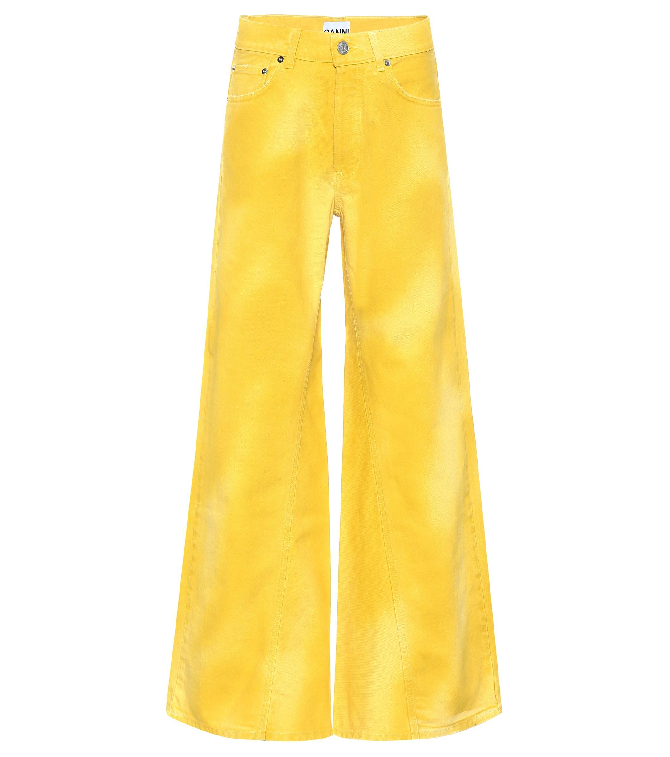 Ganni Flared Denim Jeans in Yellow 