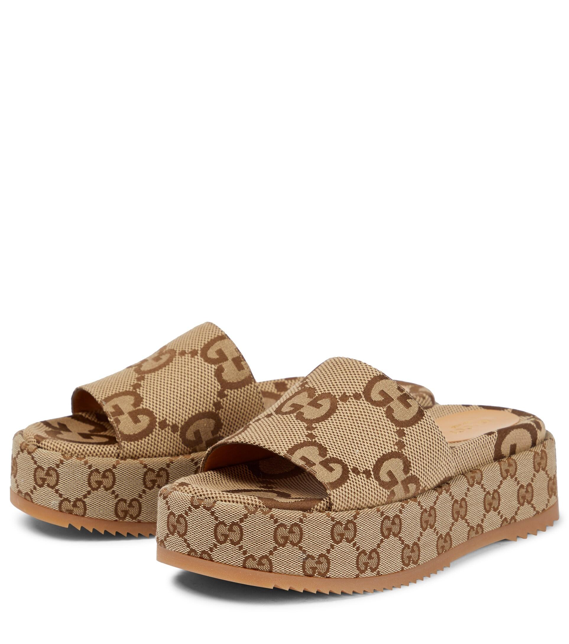Gucci GG Maxi Canvas Platform Slides in 
