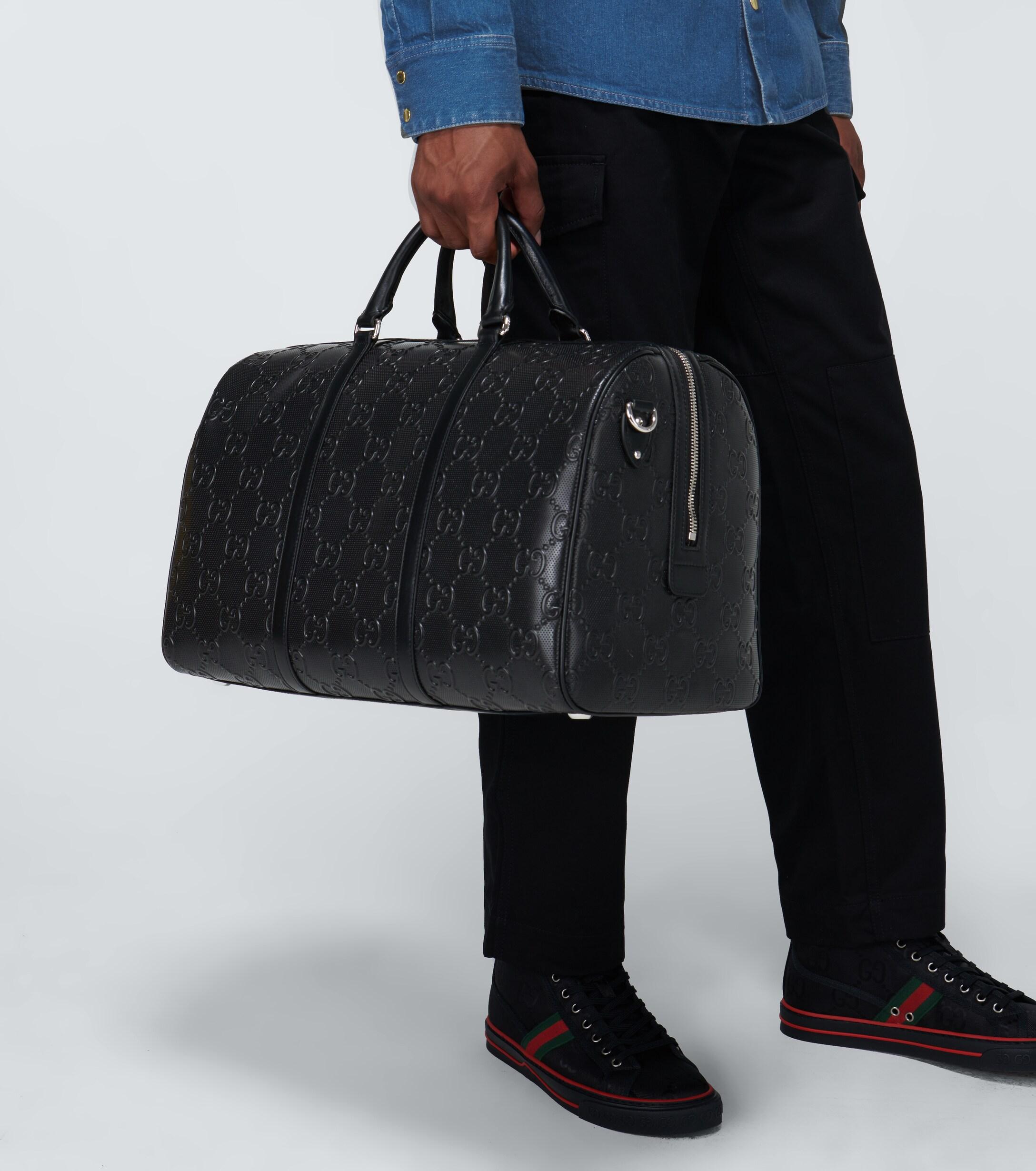 Gucci Embossed Duffle Bag in Black for Men