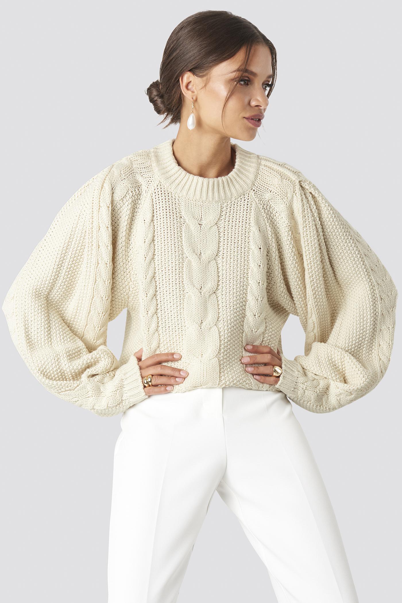 white knitted sweater