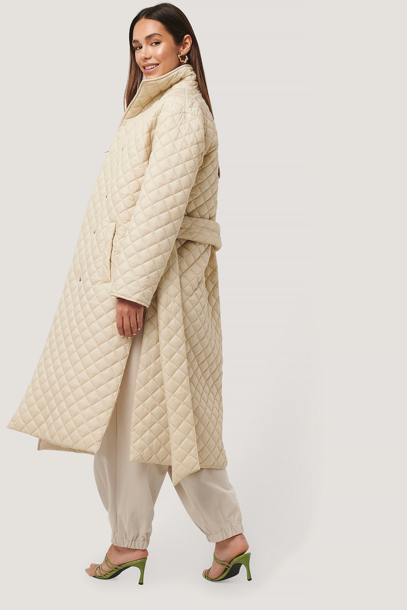 beige quilted jacket