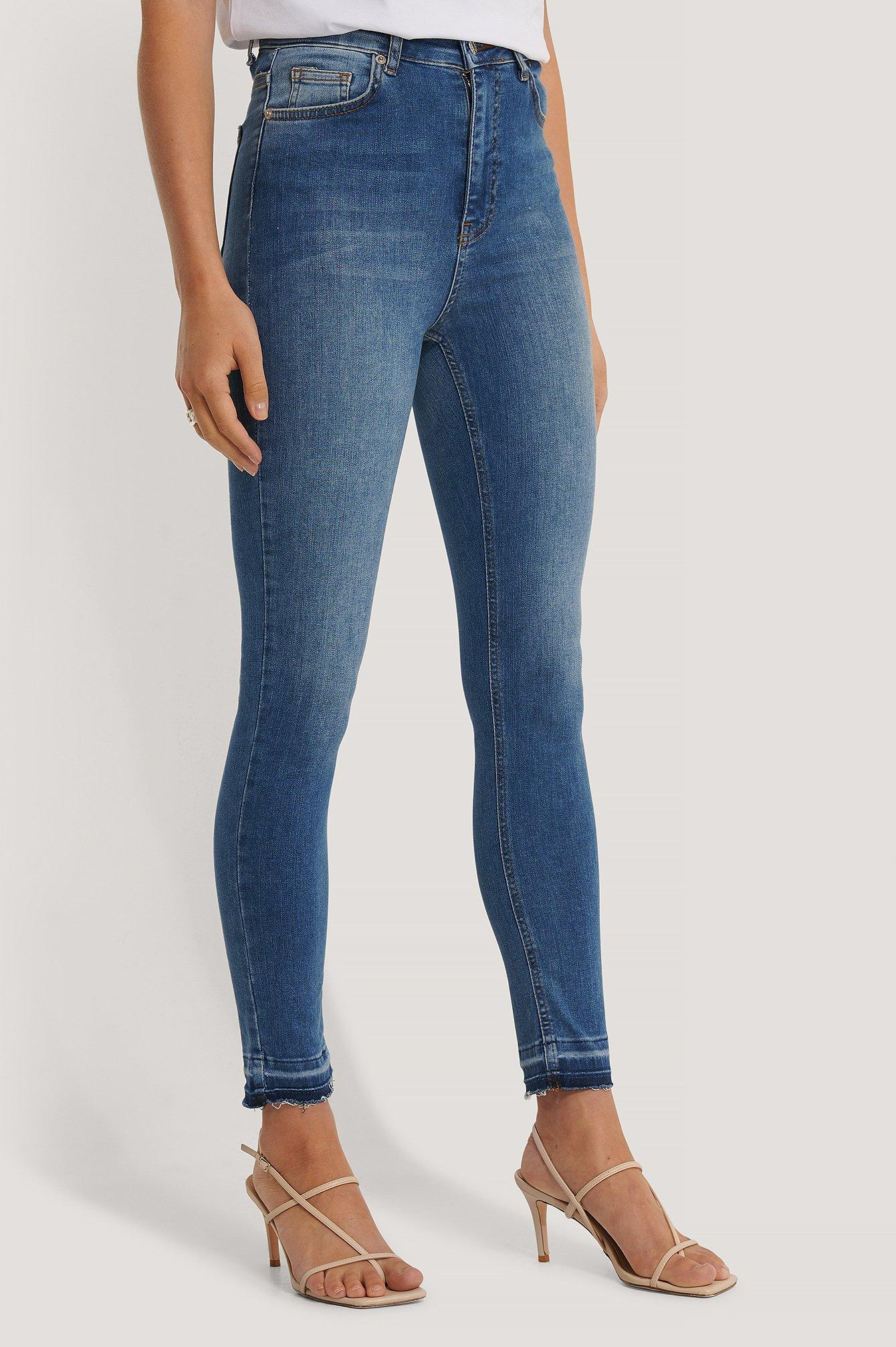 skinny high waist open hem jeans