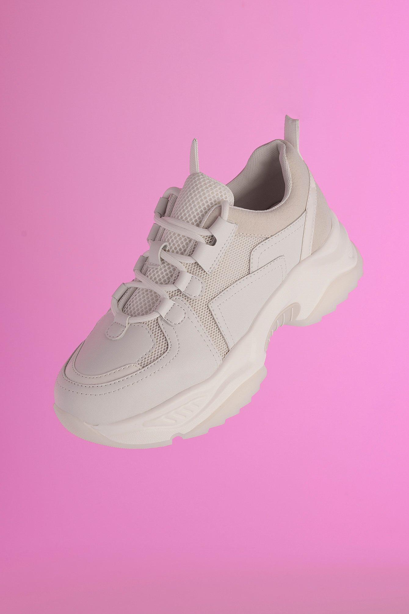 white and pink chunky trainers