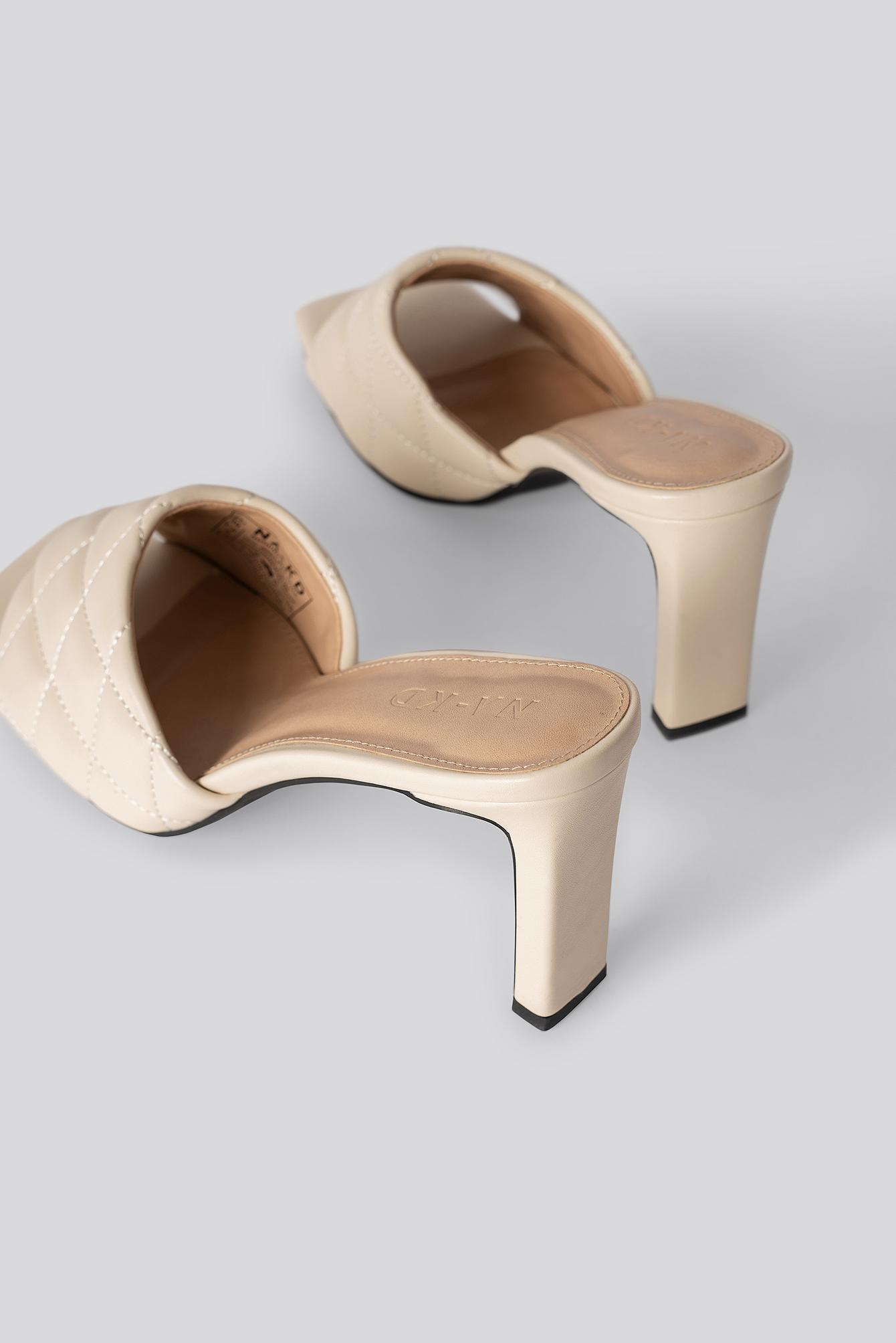beige heeled mules
