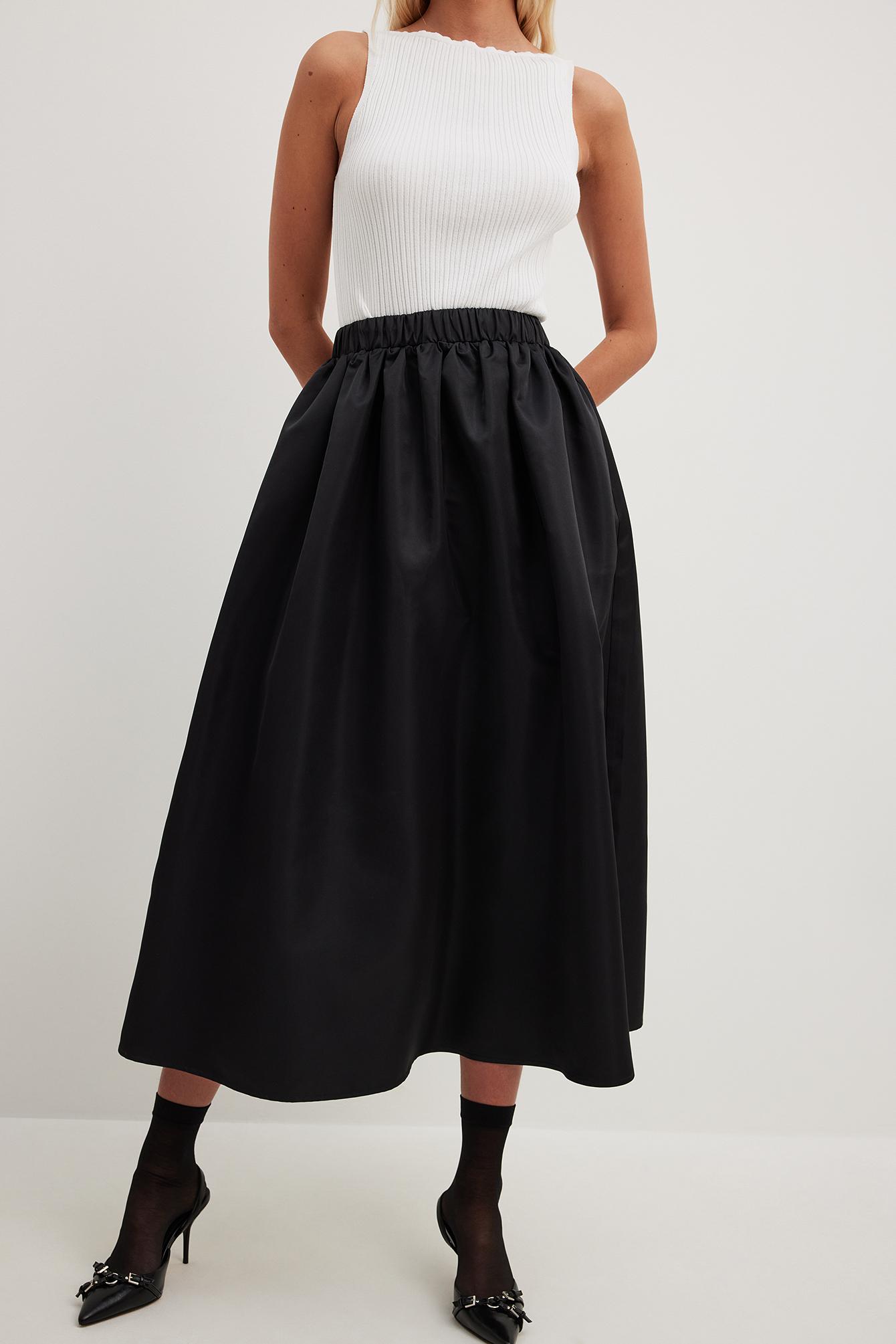 Ways To Wear A Black Slip Skirt  9 Chic Outfit Ideas  Sydne Style