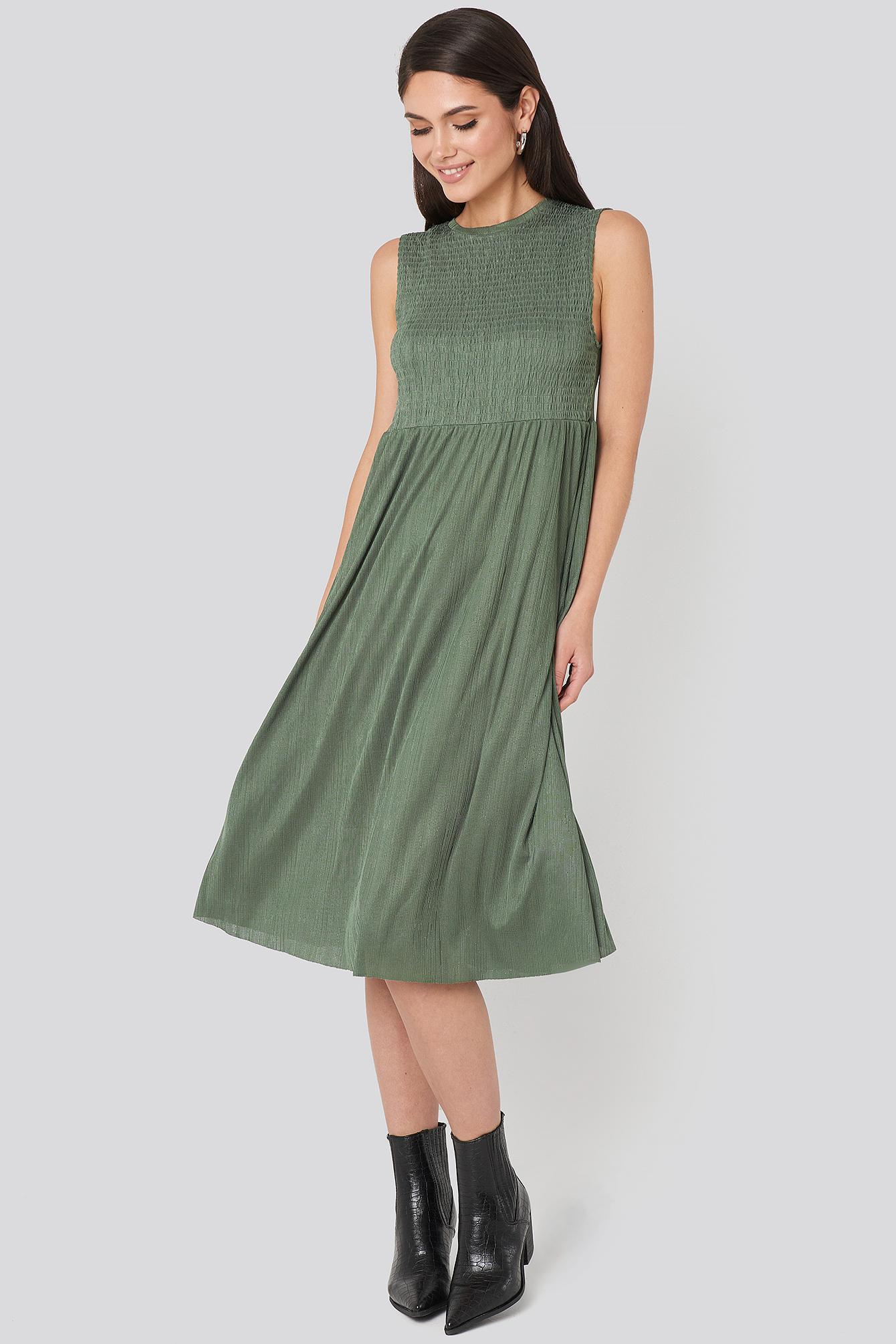 green shirred midi dress