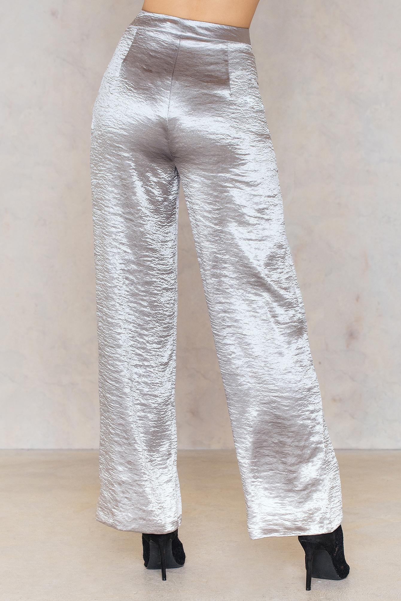 silver metallic flare pants