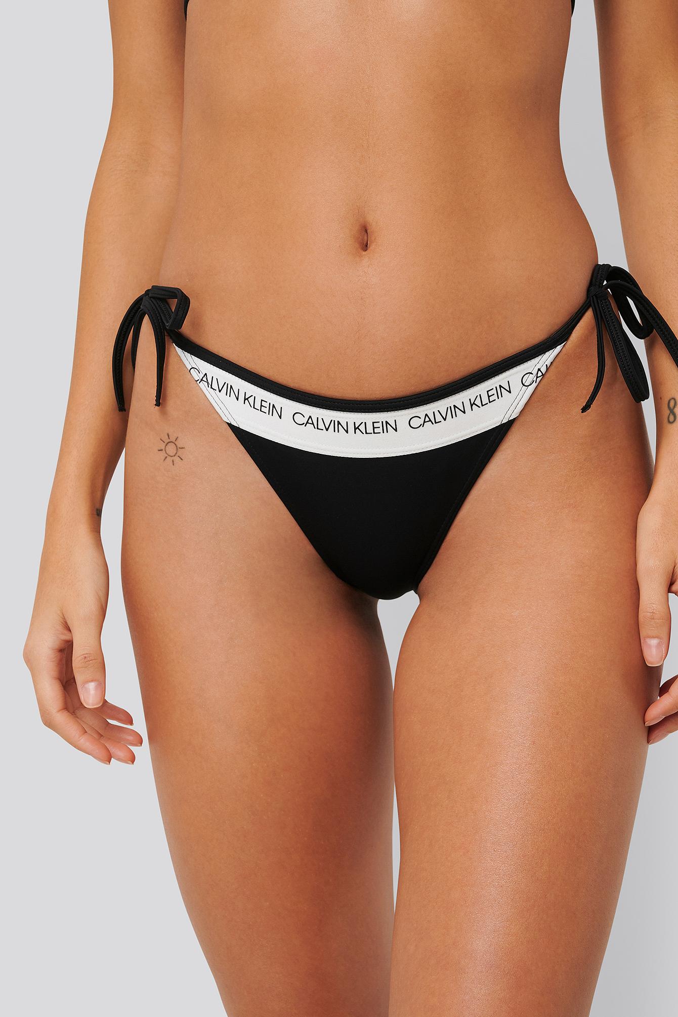 Calvin Klein Tie Side Bikini Bottom - Ck Logo in Black | Lyst