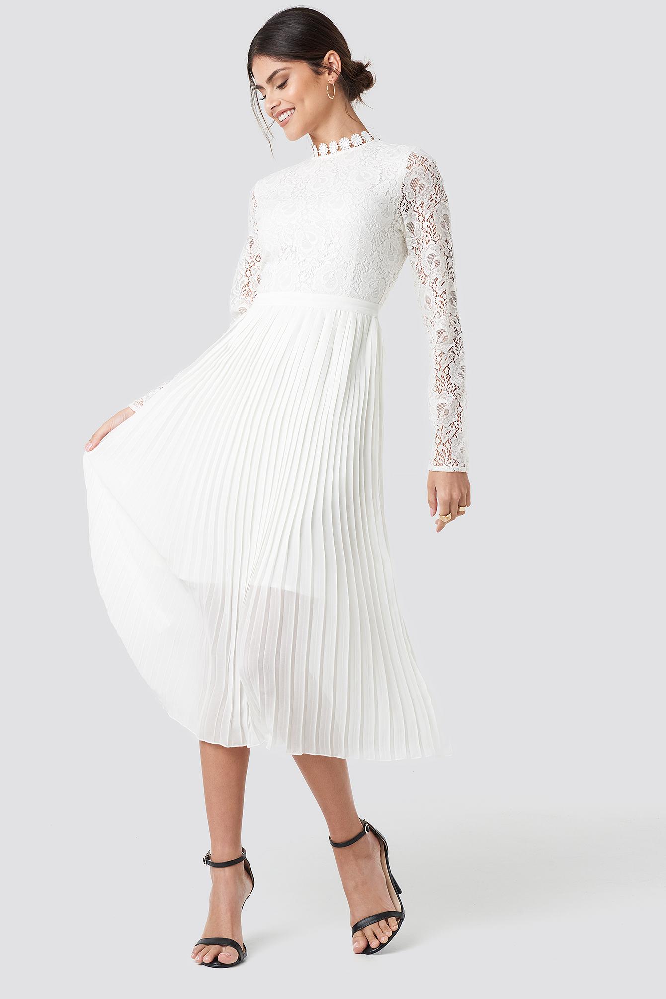 white pleated dress with sleeves