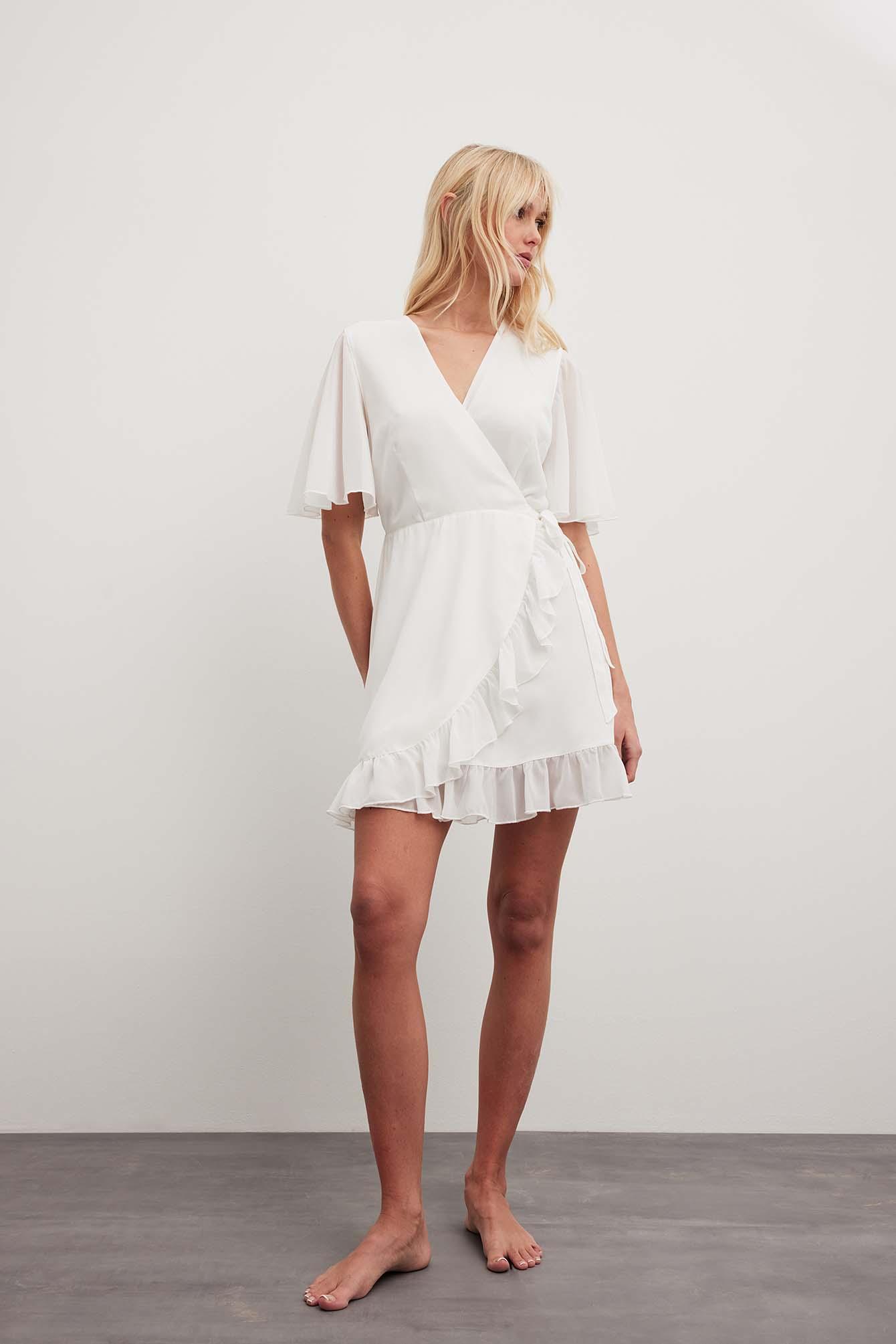 NA-KD Flowy Short Sleeve Overlap Mini Dress in White | Lyst