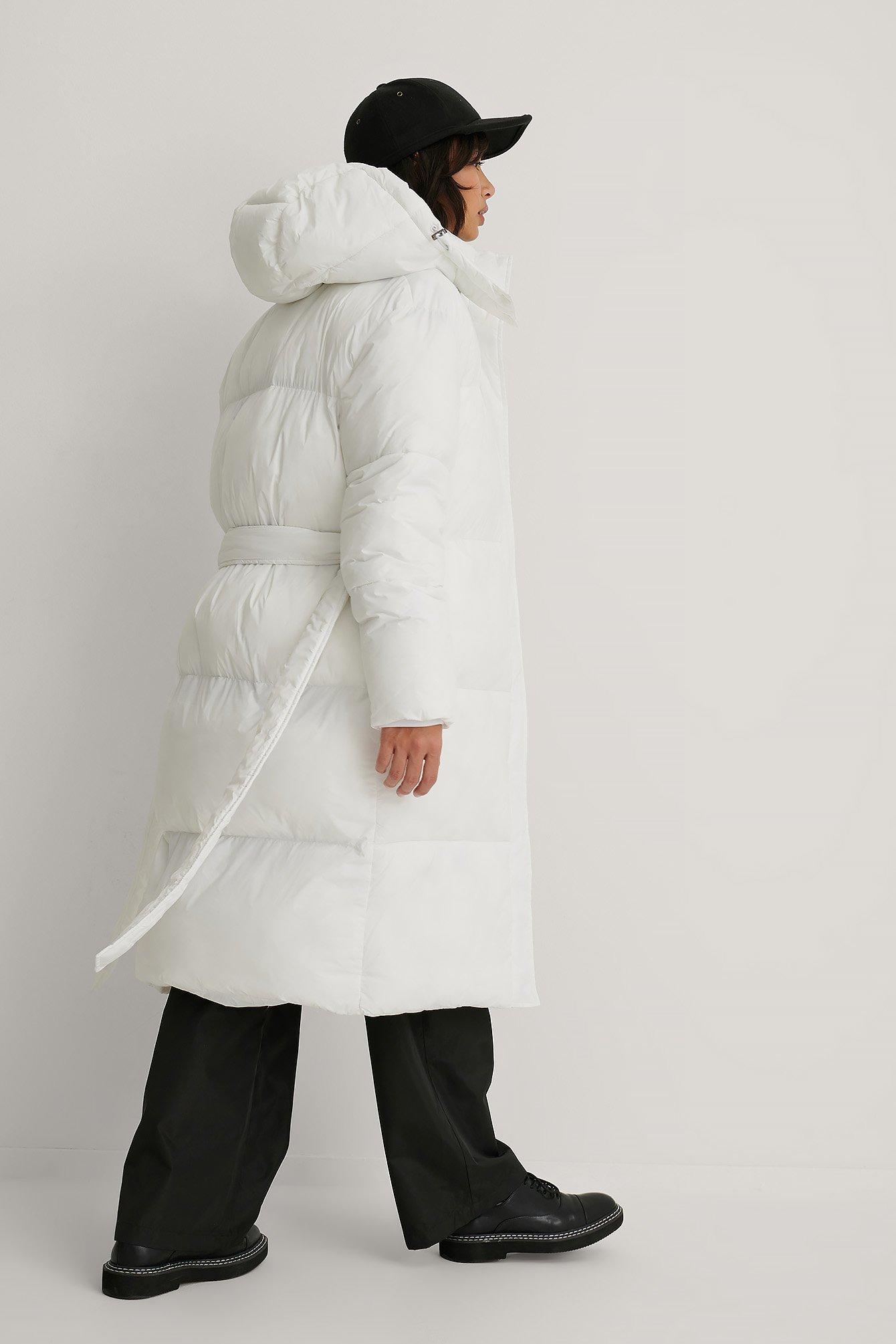 white belted puffer jacket