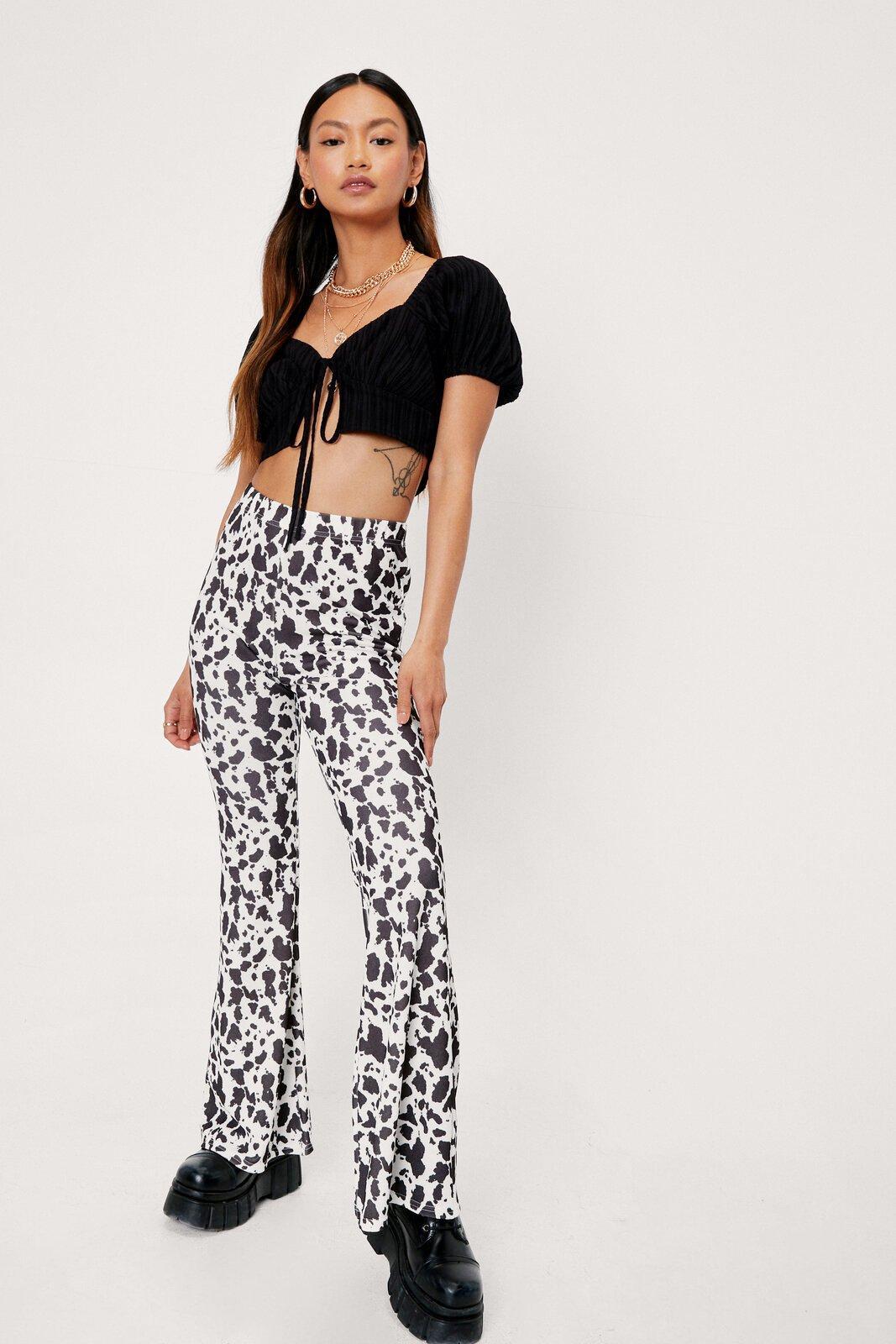 High Waisted Cow Print Flares 