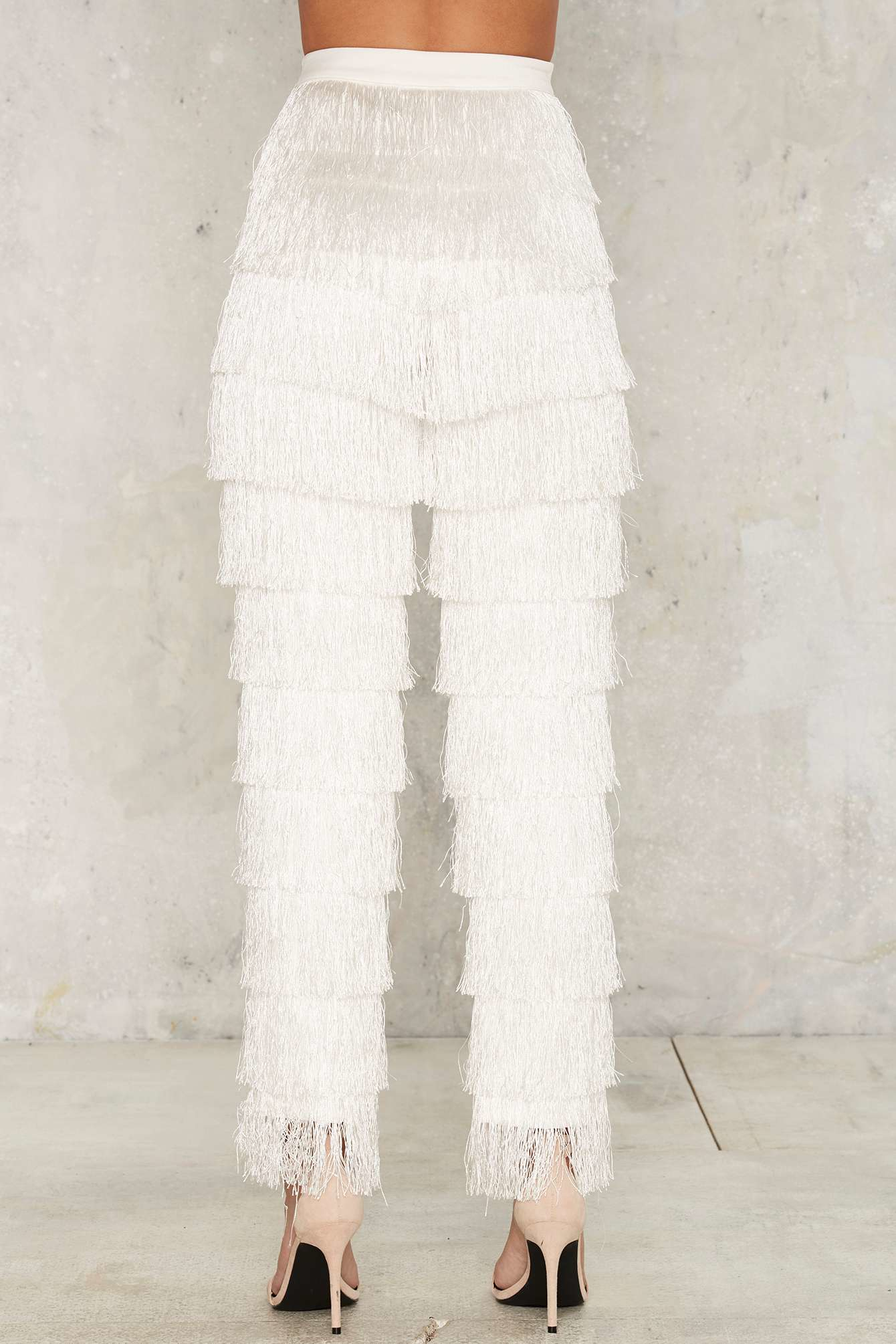 white pants with fringe bottom