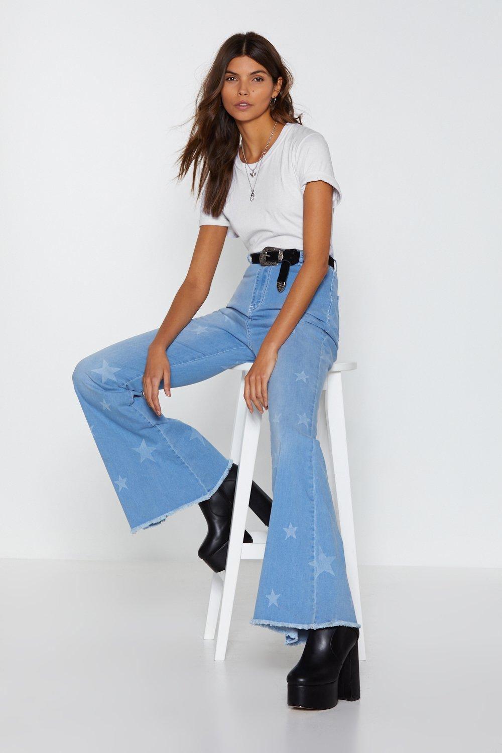 flare jeans with stars on them