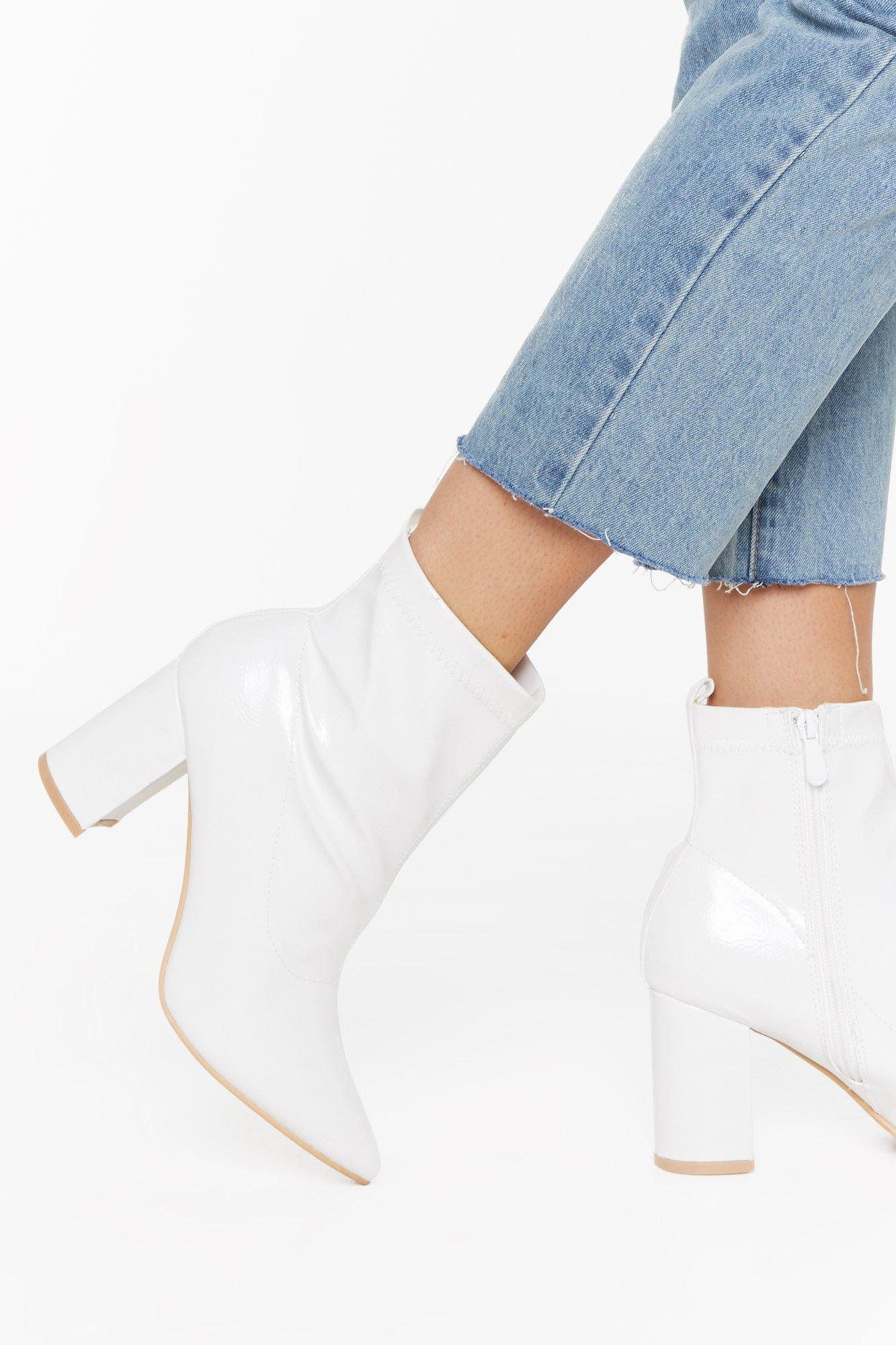 pointed white boots