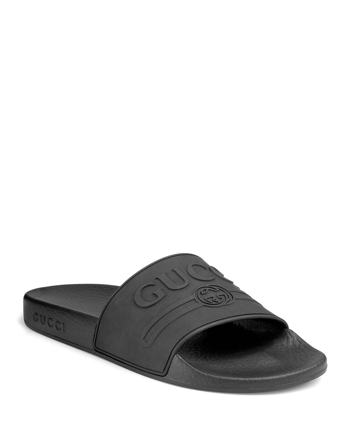 Gucci Rubber Pursuit Logo-embossed Slides in Black for Men - Save 60%