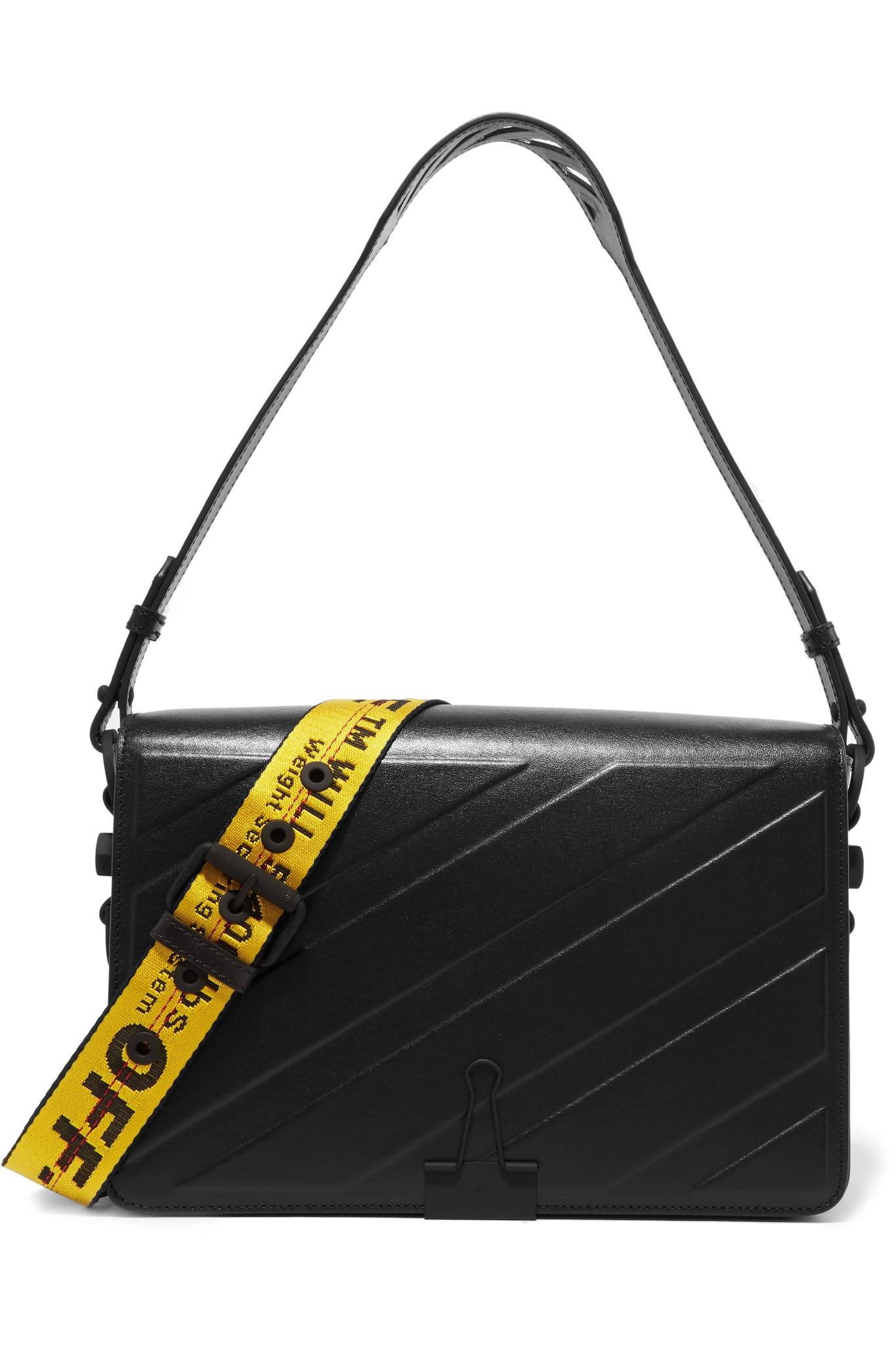 black bag with yellow strap