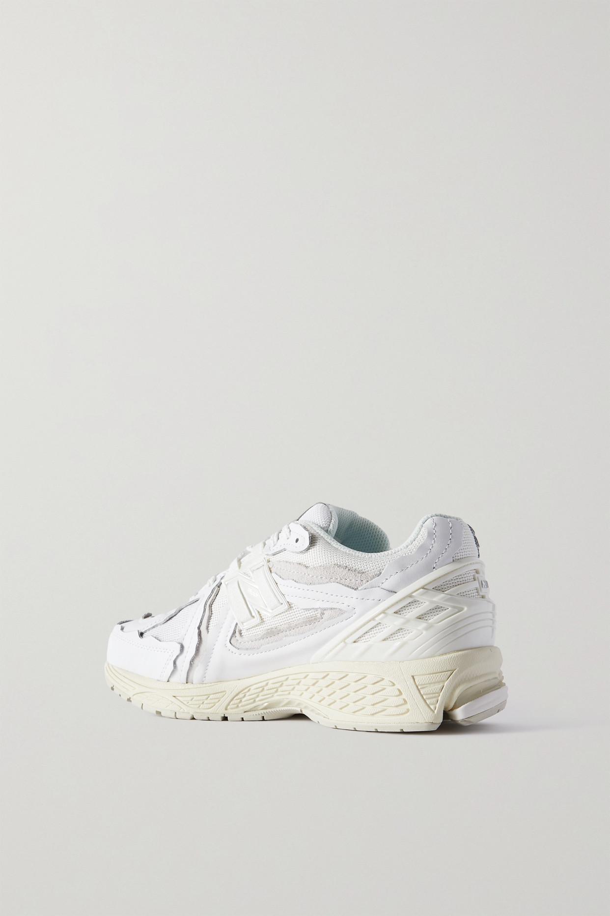 https://cdna.lystit.com/photos/net-a-porter/1383eb25/new-balance-White-1906-Rubber-trimmed-Suede-Leather-And-Mesh-Sneakers.jpeg