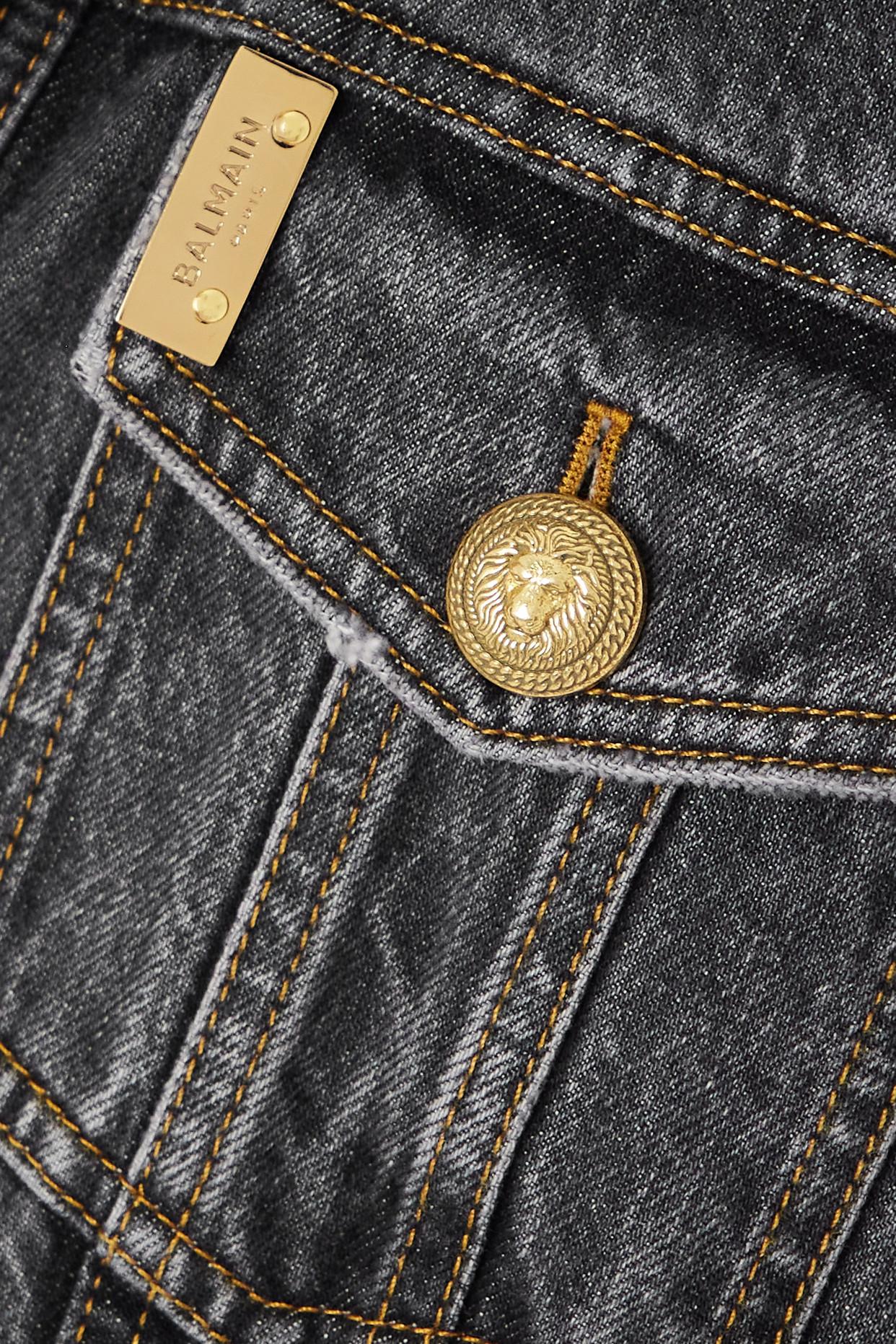 Balmain Cropped Button embellished Distressed Denim Jacket in
