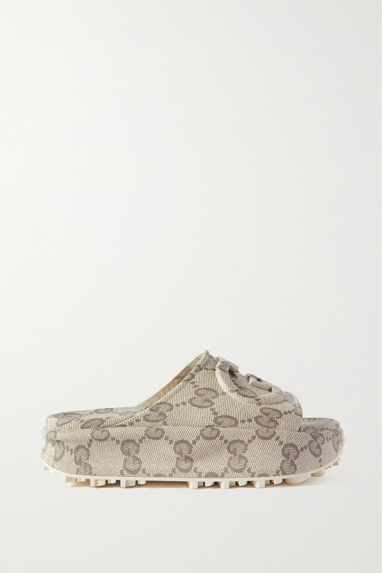 Gucci Embossed Logojacquard Coatedcanvas Platform Slides in Natural
