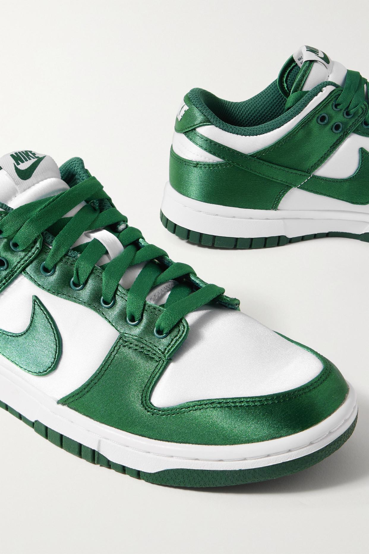 Nike Dunk Low sneakers in white and green