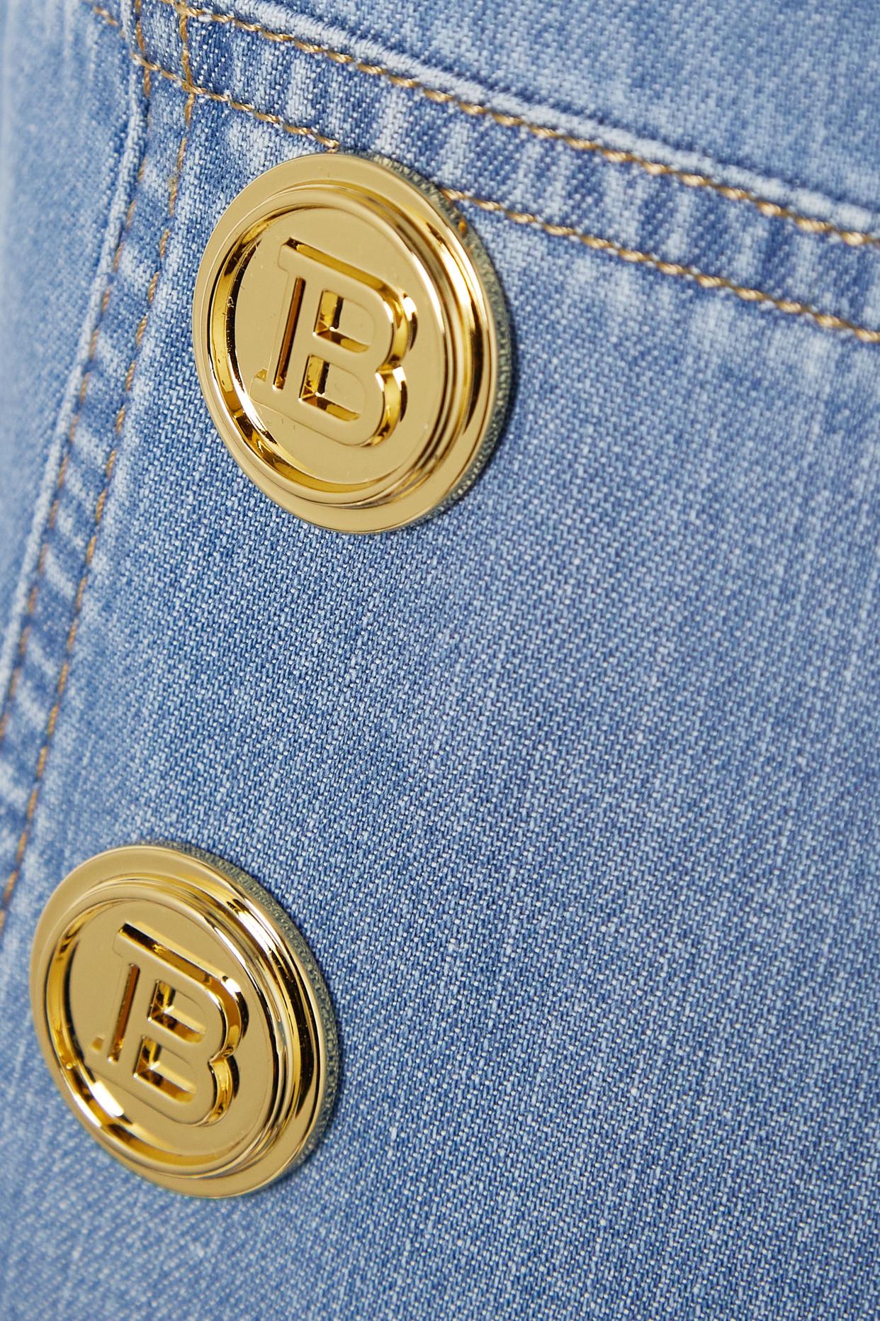 Balmain Button-embellished Denim Jumpsuit Lyst