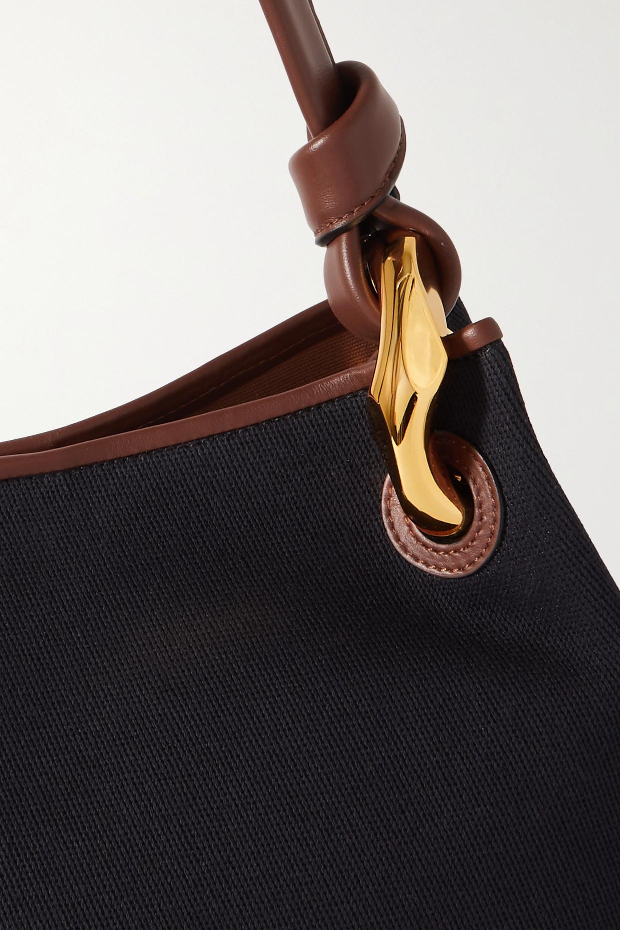 JW ANDERSON Chain-embellished leather-trimmed cotton-canvas bucket bag