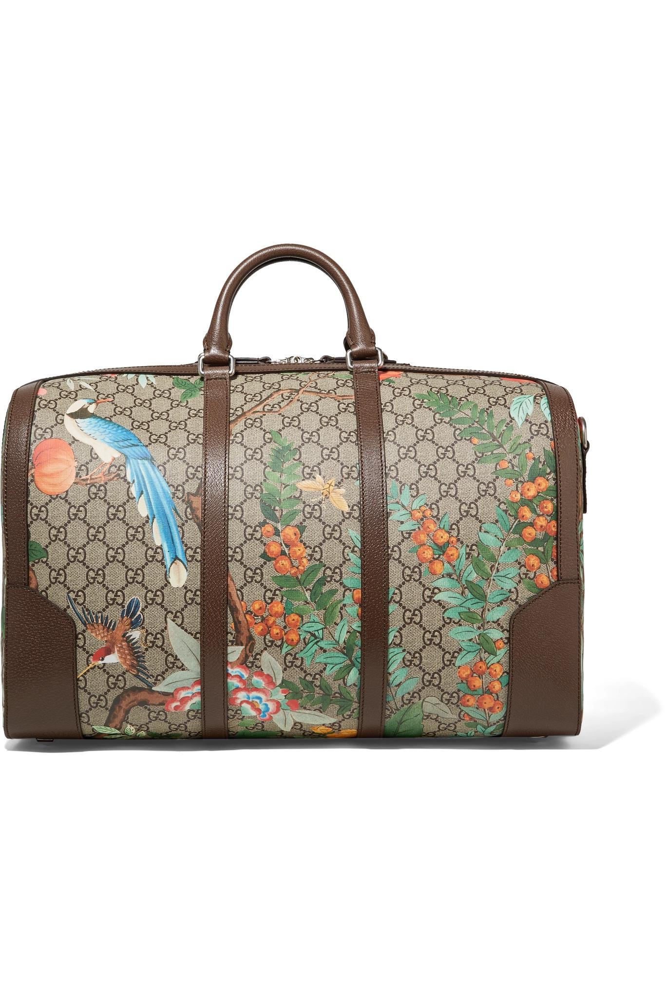 Gucci Leather-trimmed Printed Coated-canvas Weekend Bag in Natural - Lyst