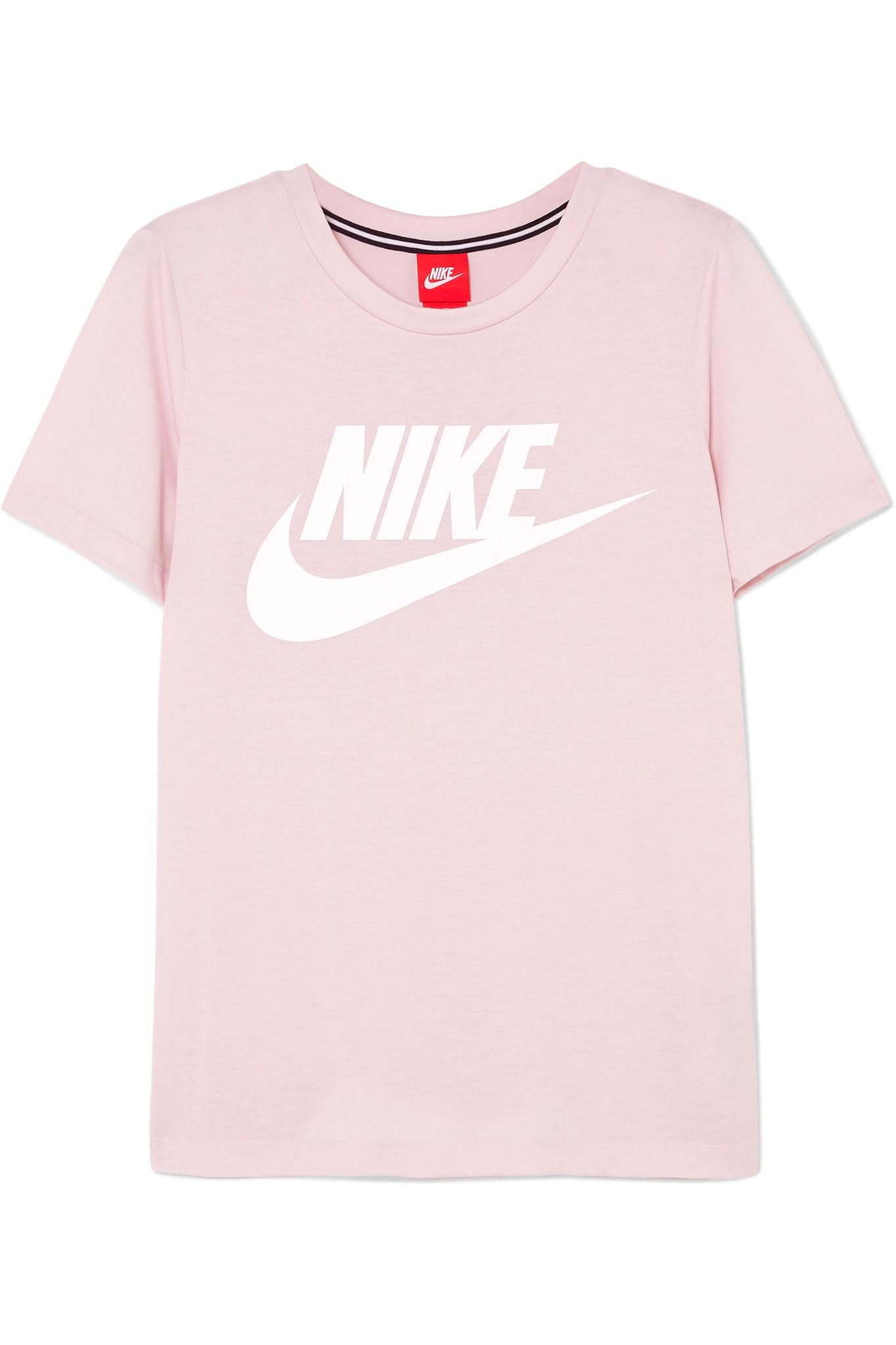 white and pink nike shirt