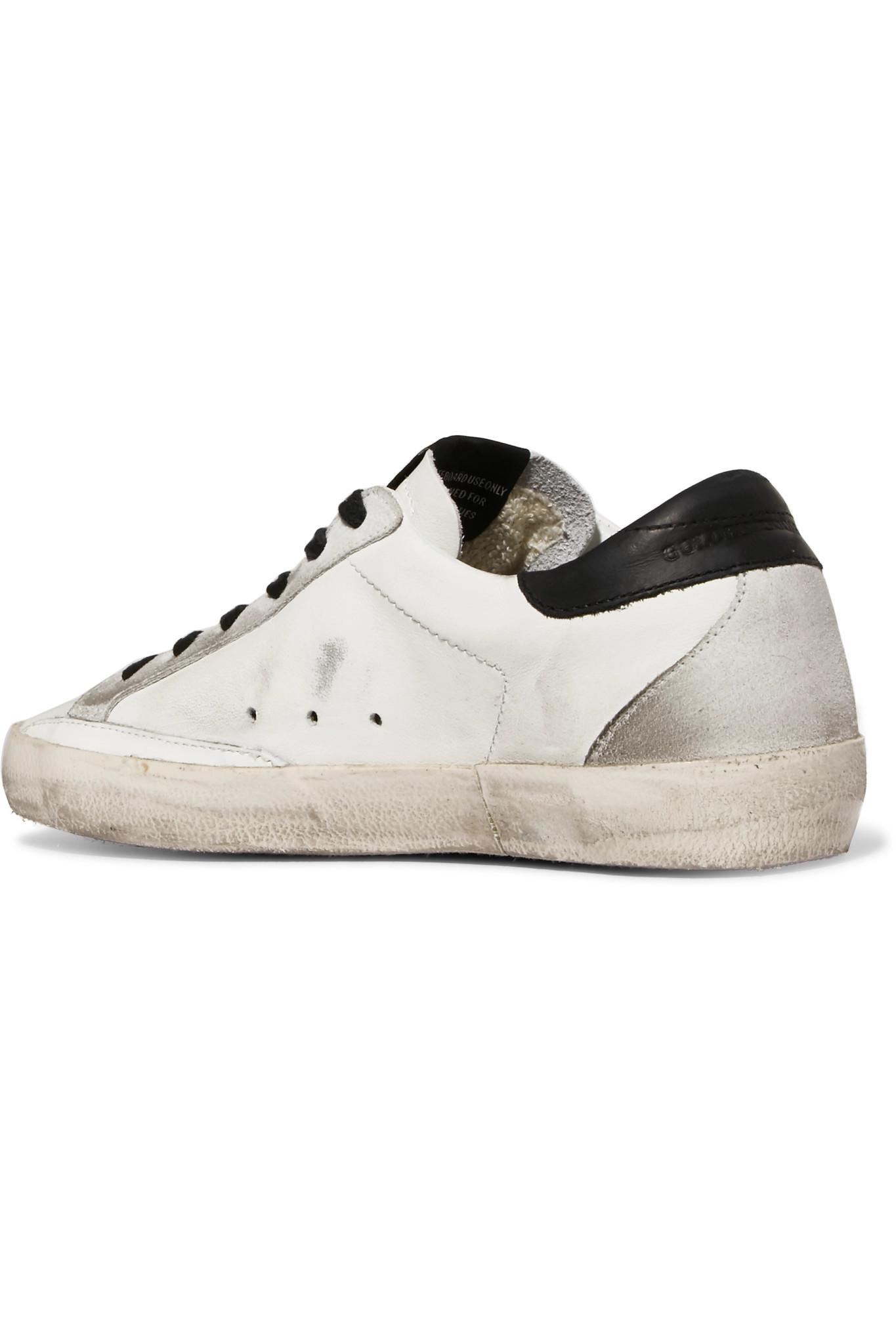 golden goose superstar distressed leather and suede sneakers