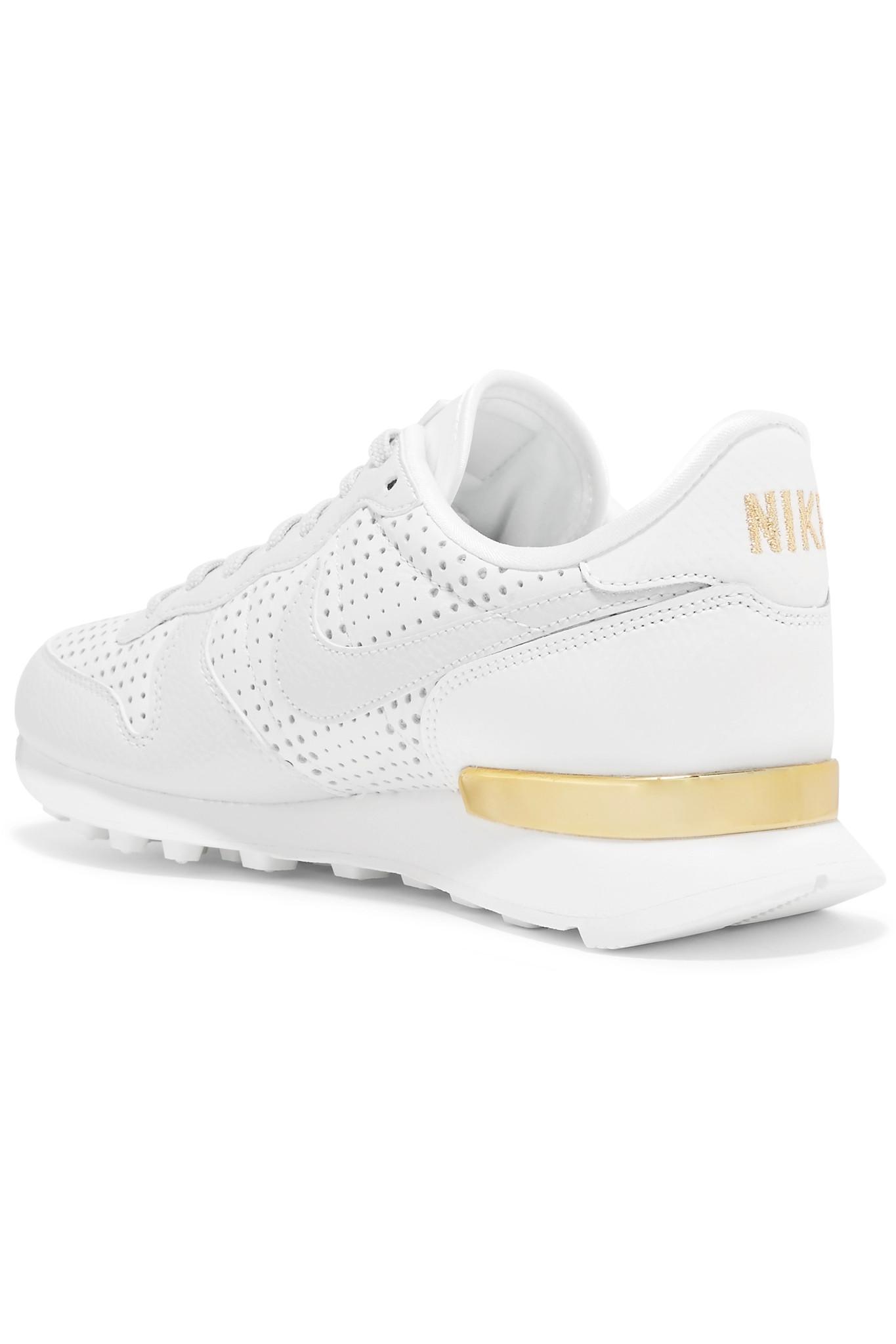 Nike white perforated leather deals shoes