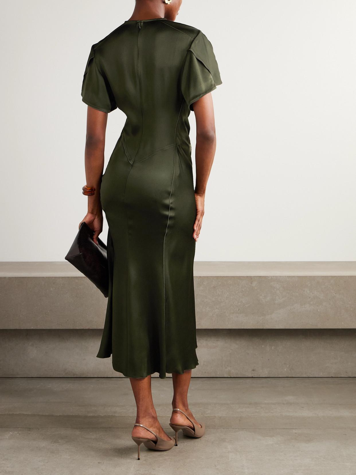 victoria beckham dark green dress Victoria Beckham's Green Dress Is Rapidly Approaching Cult Status