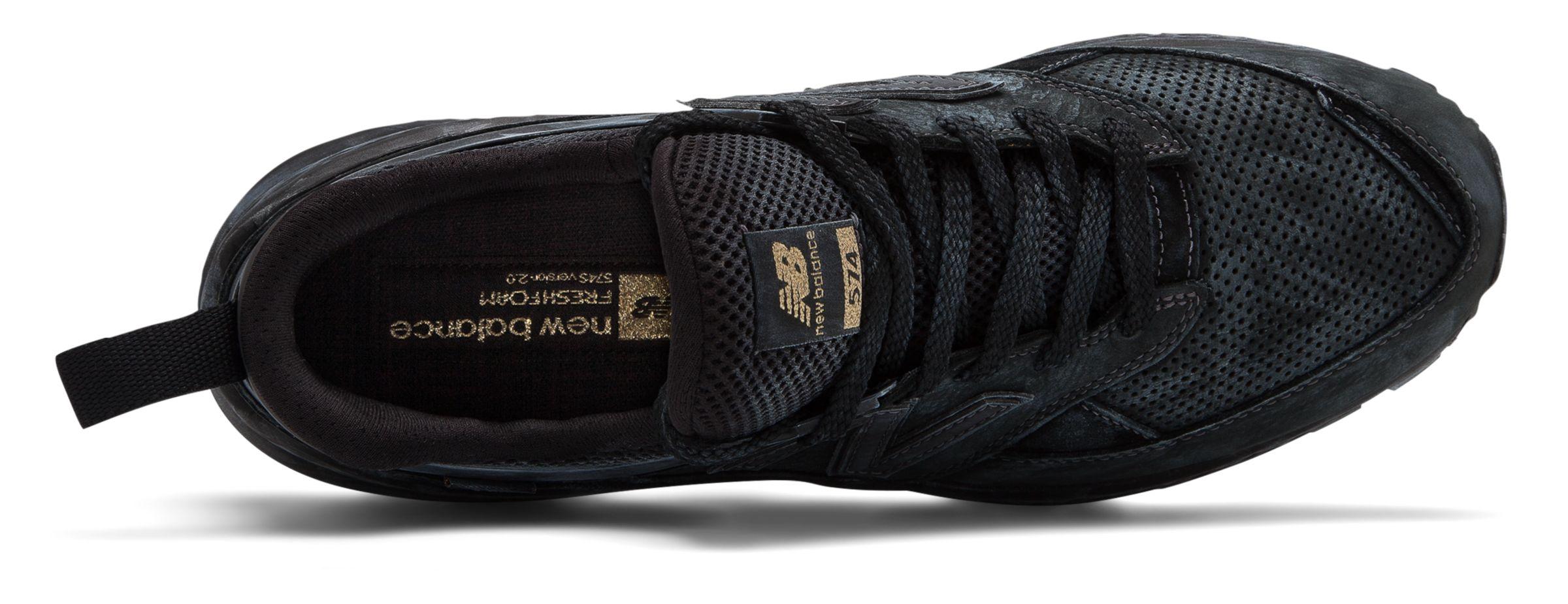 new balance 574 black caviar