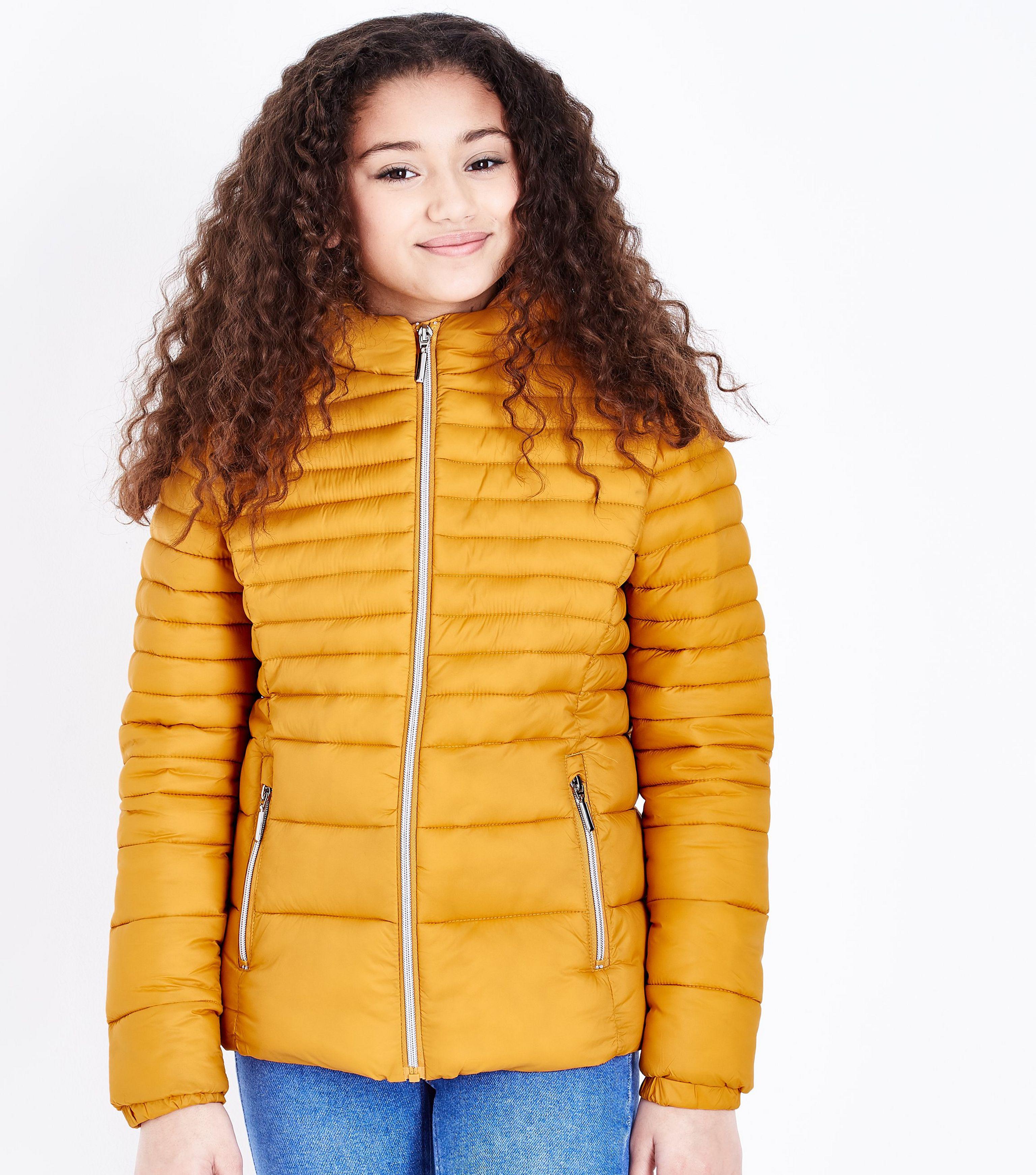mustard hooded puffer jacket