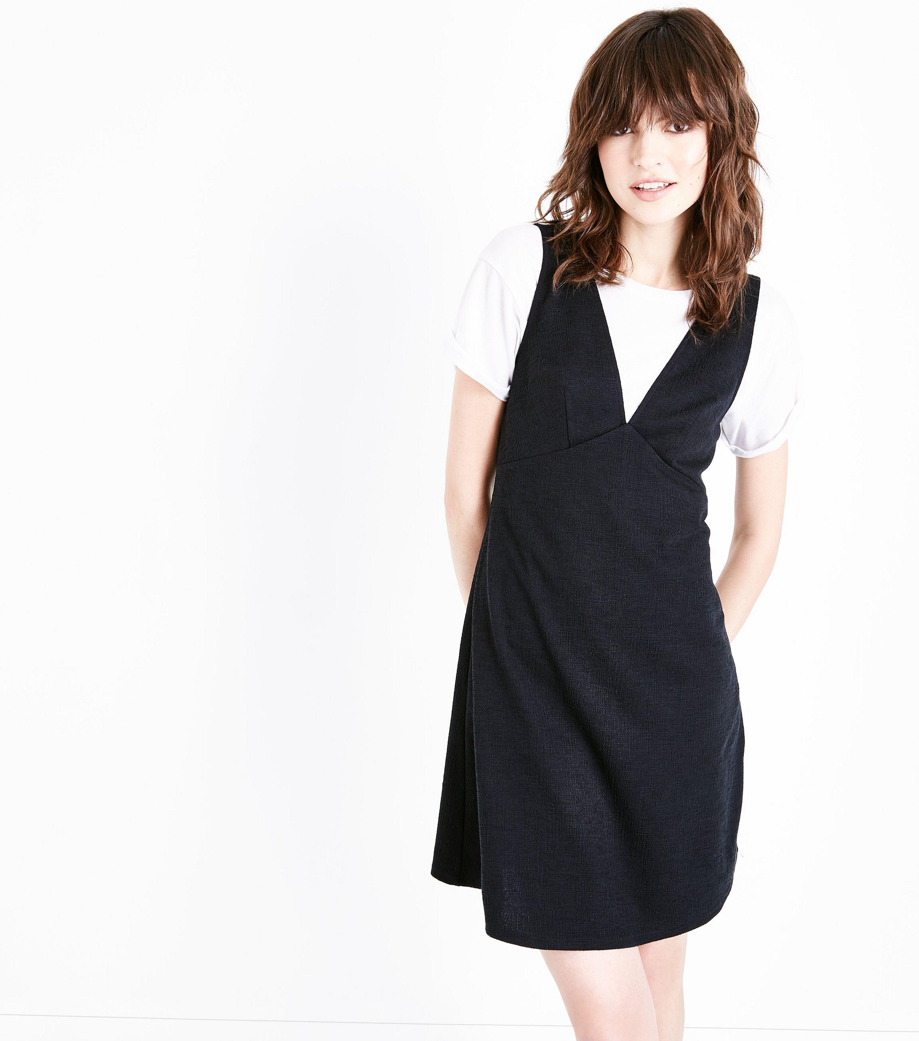 black v neck pinafore dress