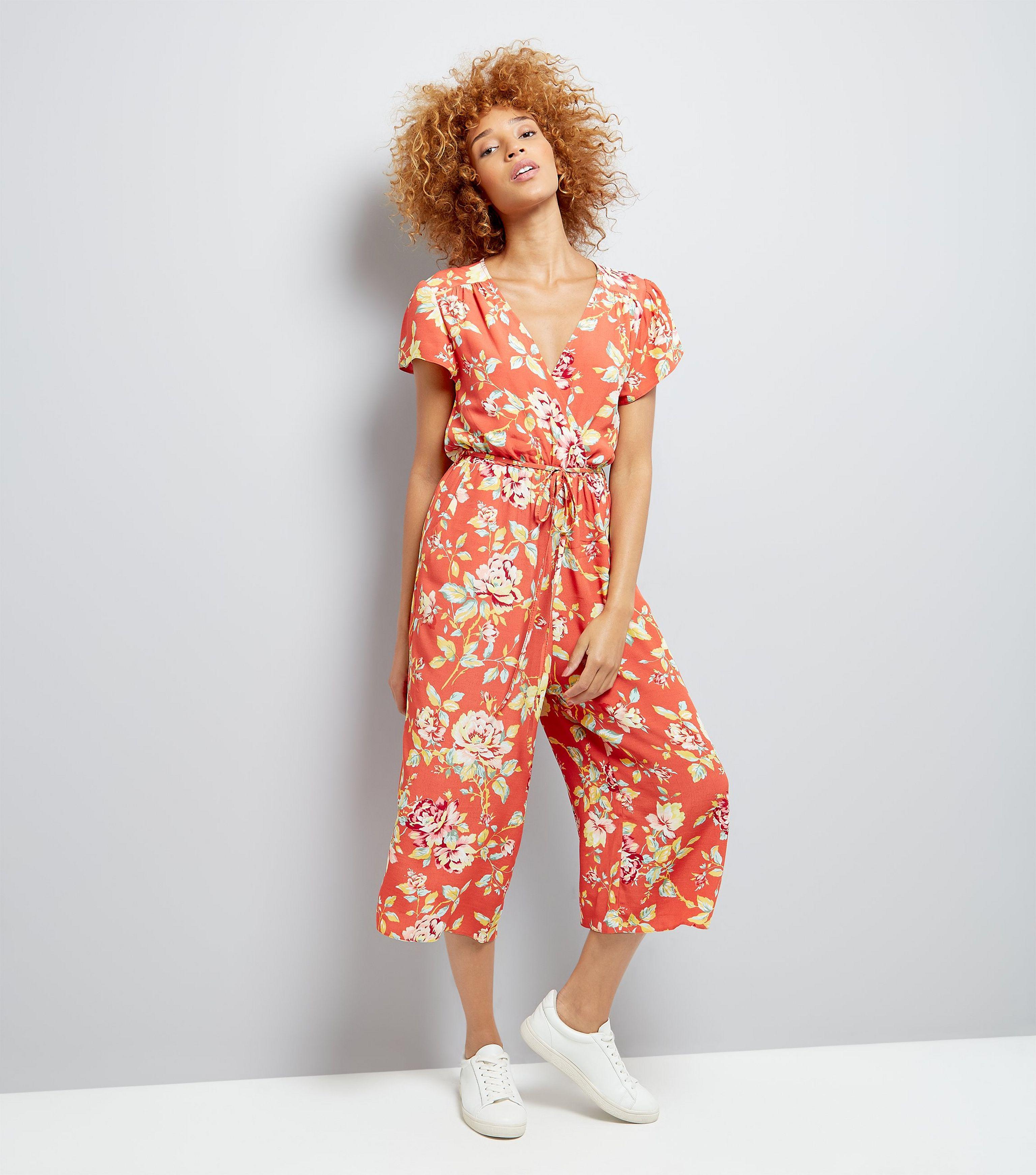 orange floral jumpsuit