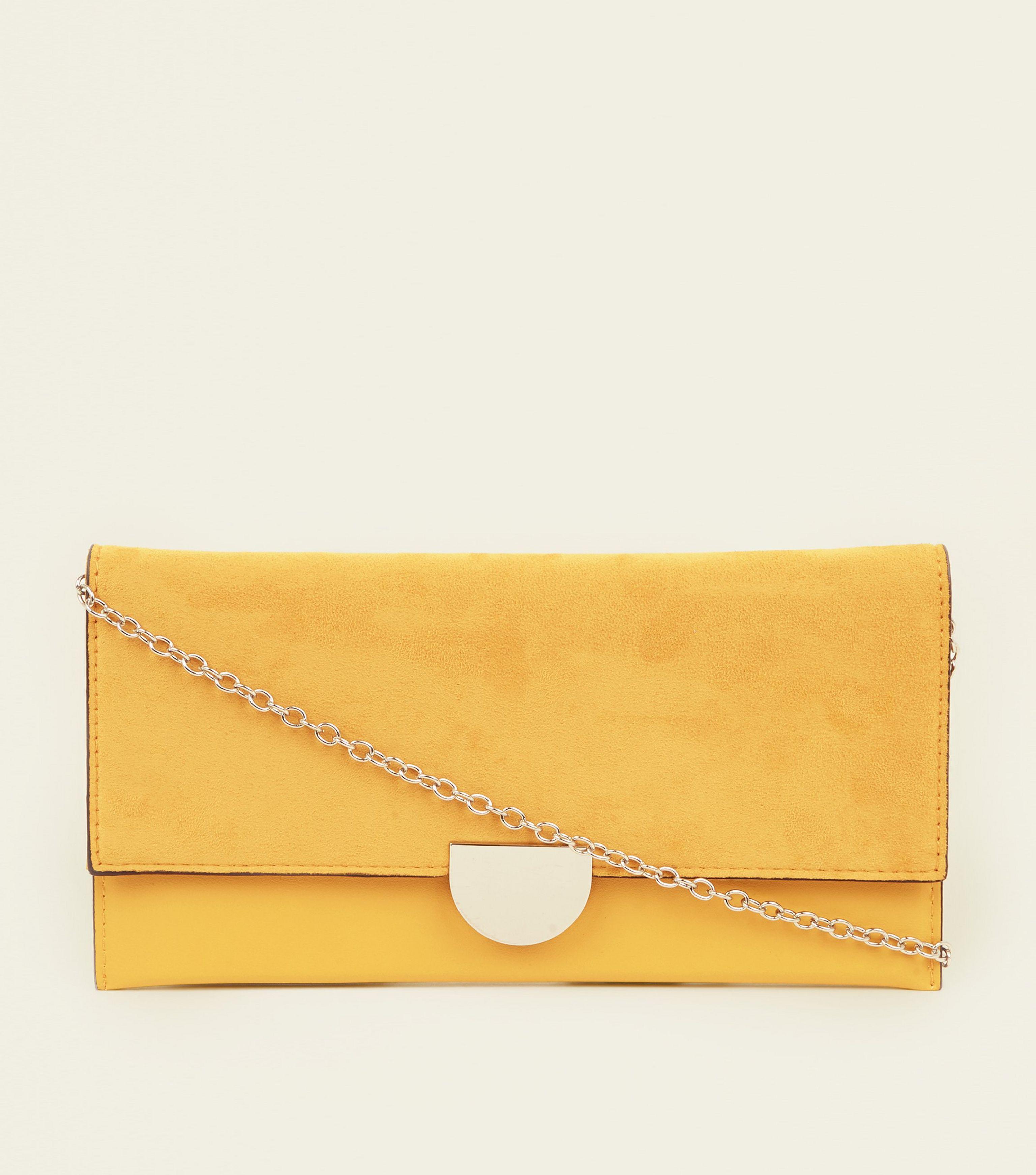 yellow clutch bag new look