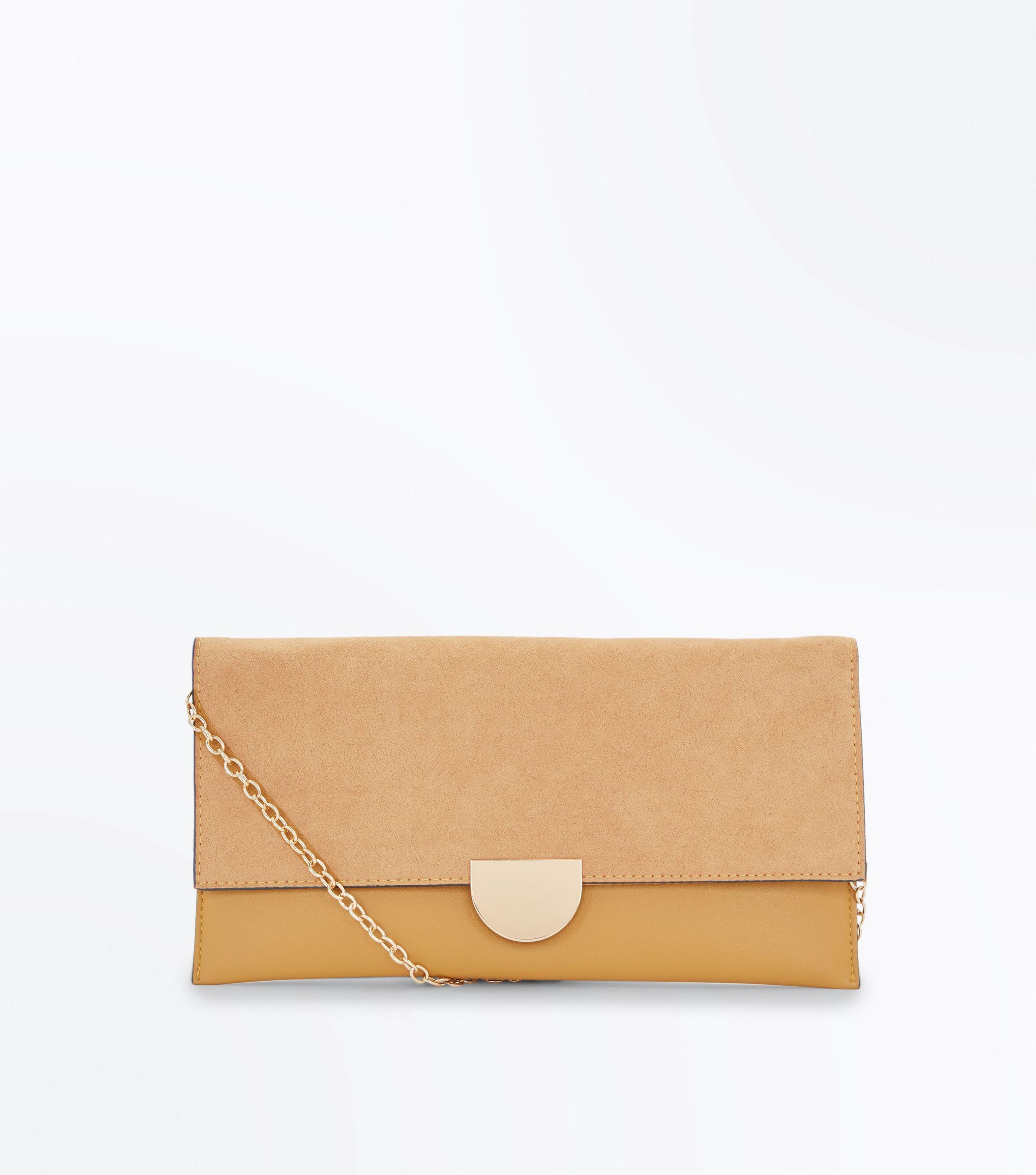 new look mustard clutch bag